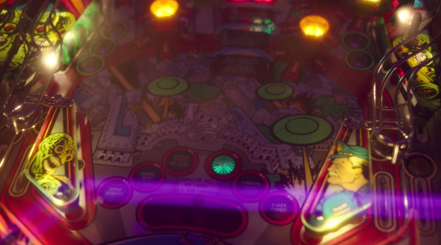 Colorful pinball machine playfield with glowing lights and complex design