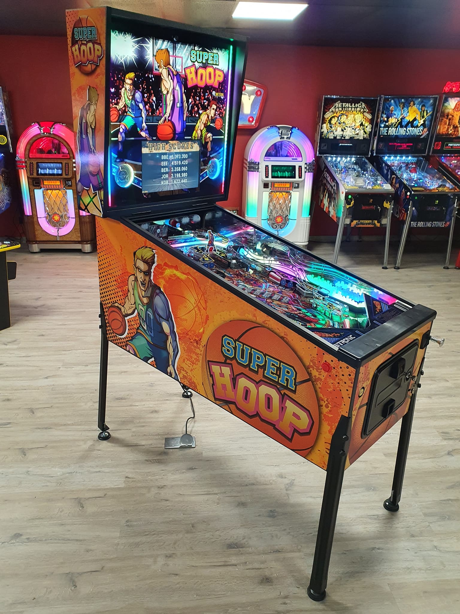 Super Hoop basketball-themed pinball machine with colorful arcade background