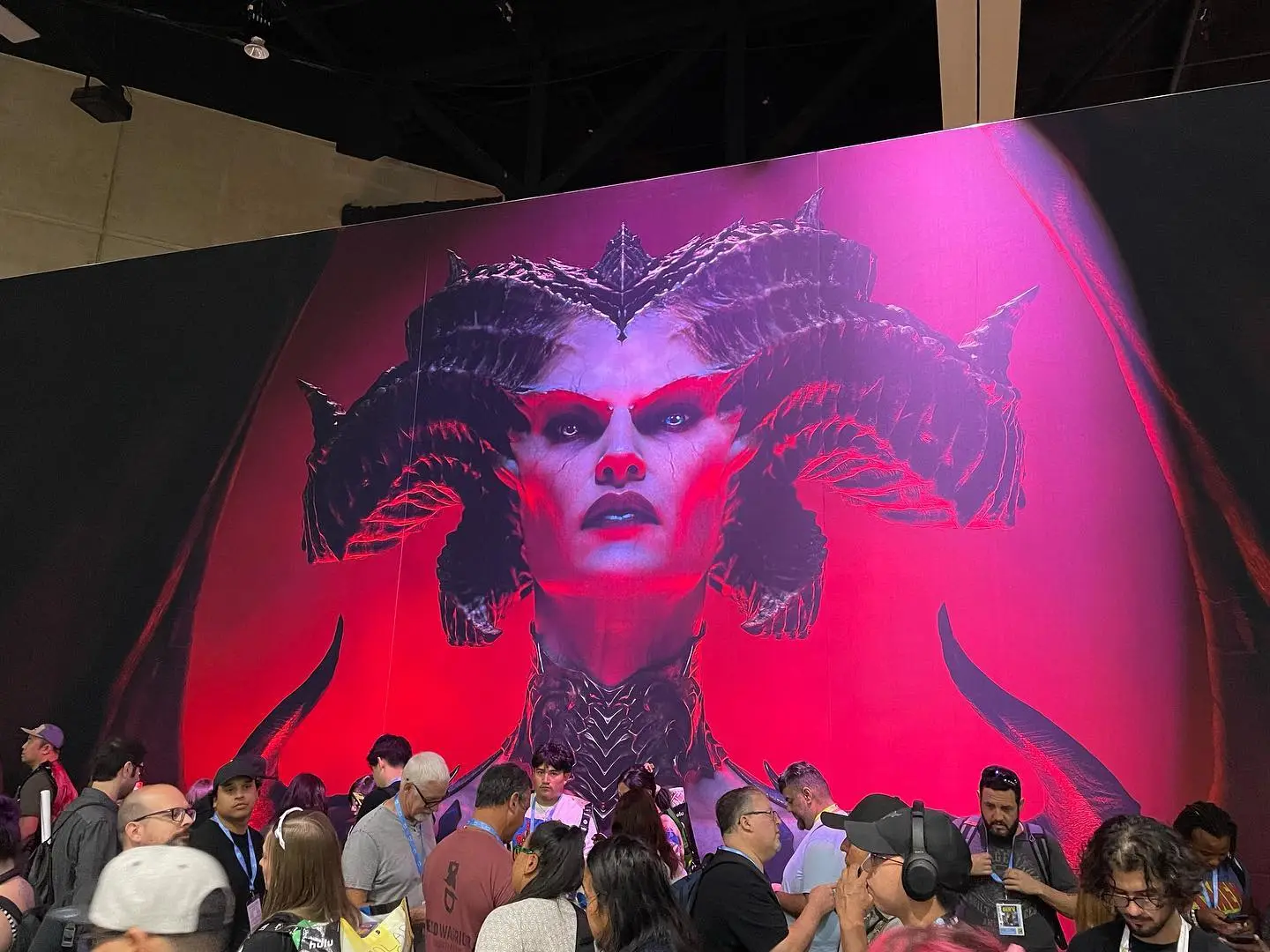 Diablo 4 poster with demonic character in red and purple lighting