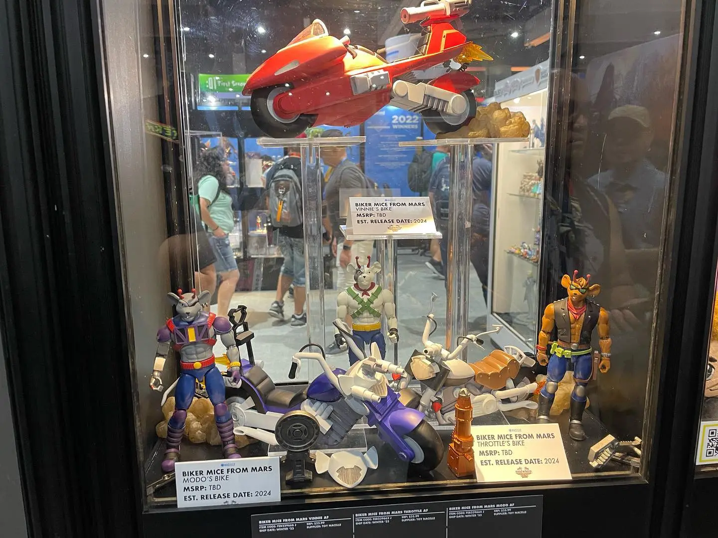 Biker Mice from Mars action figures and motorcycles in display case