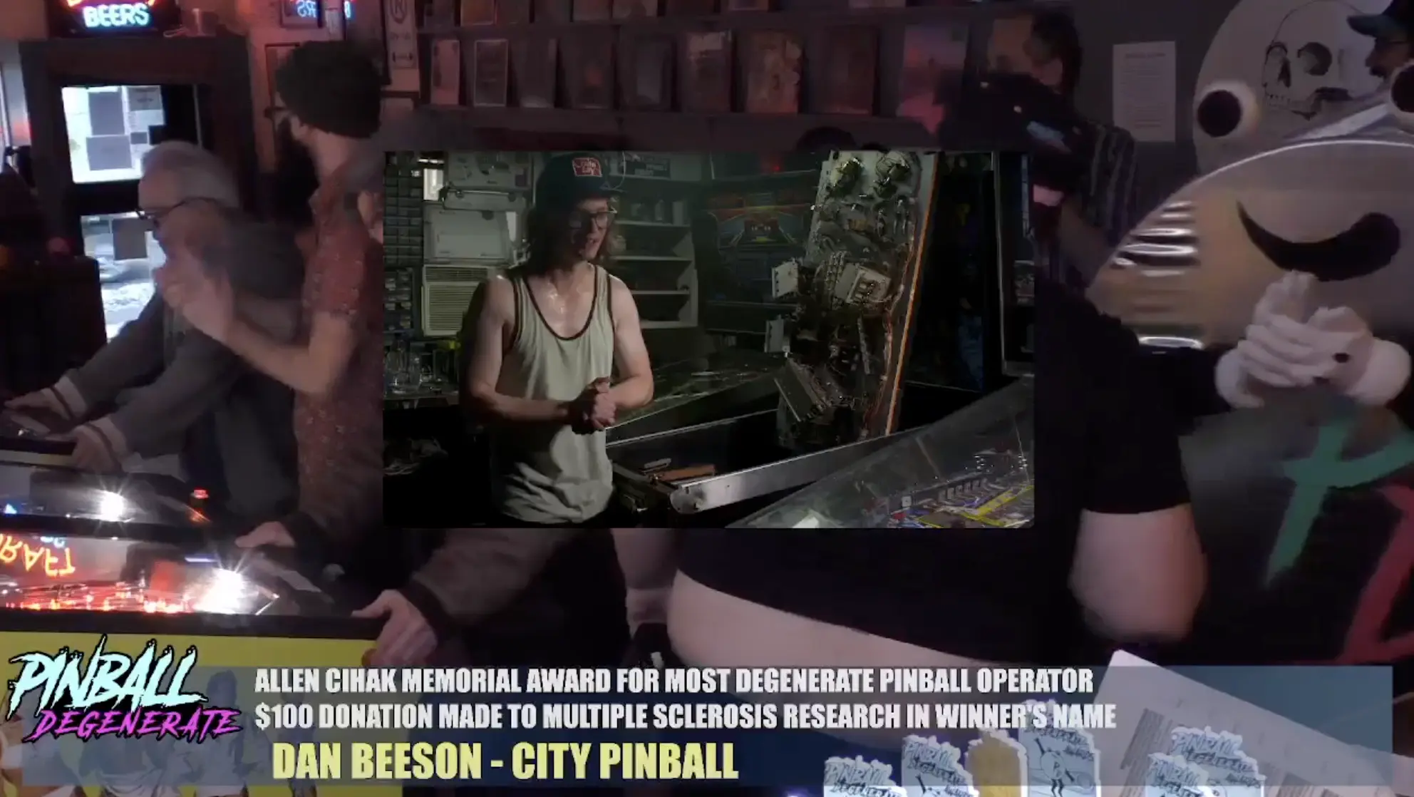 Pinball player receiving humorous award at Pinball Degenerate event