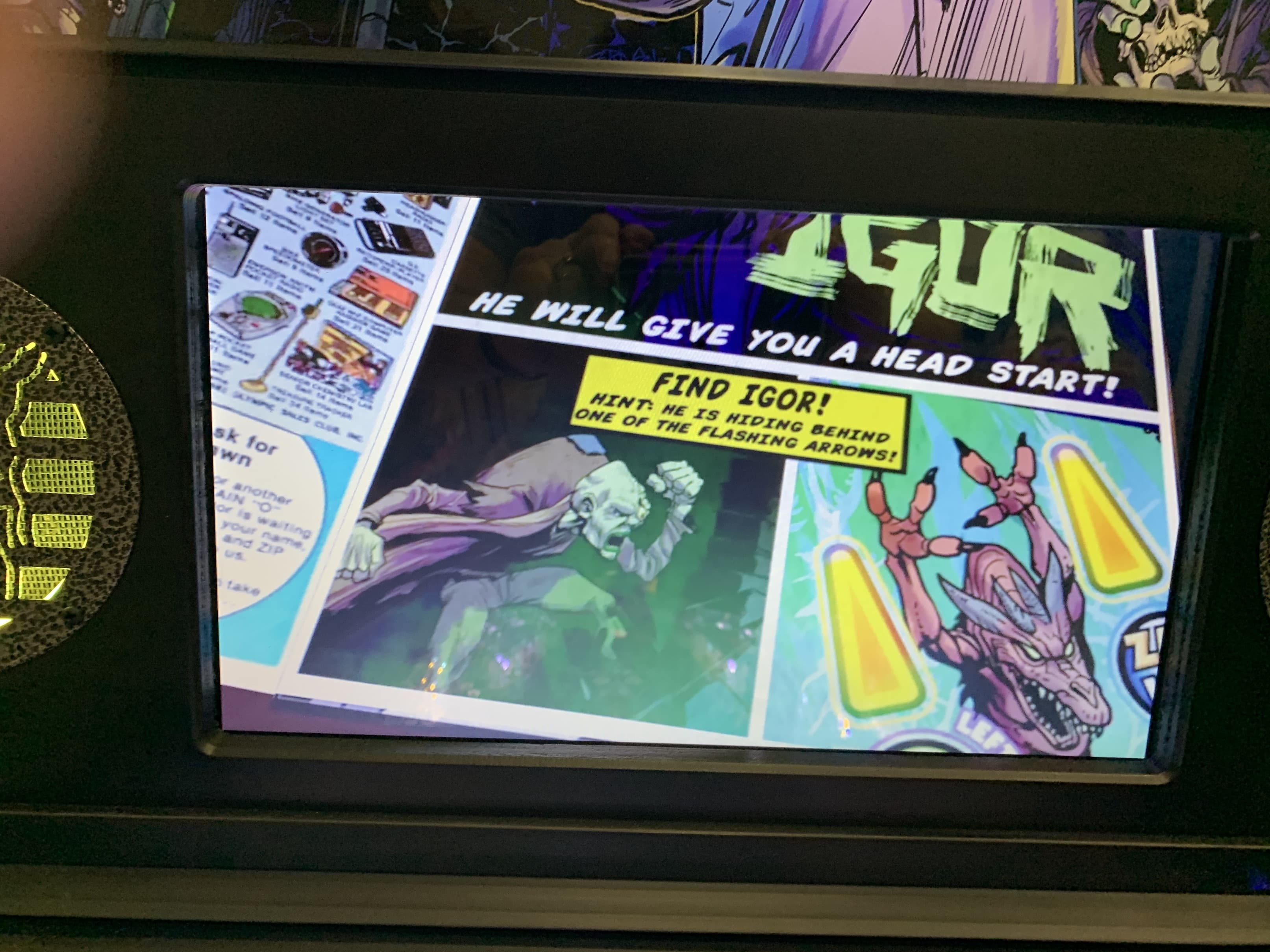 Comic panel with Igor and dragon, showing game hint and colorful design