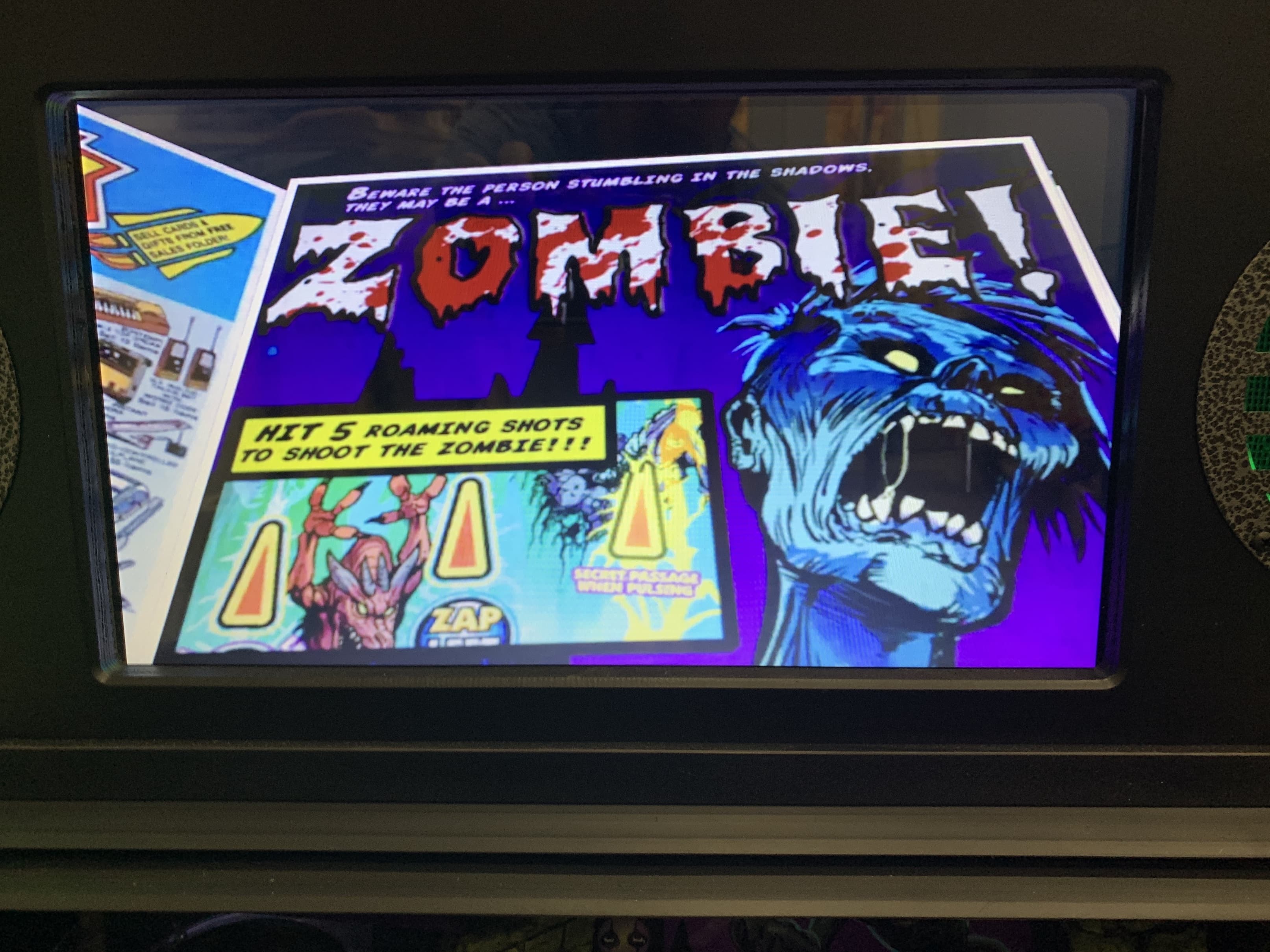 Zombie game screen with blue monster and shooting instructions