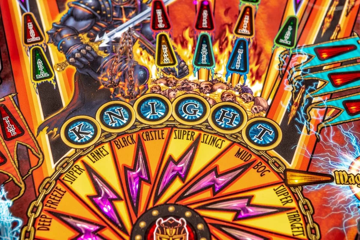 Colorful knight pinball machine with fiery background and lightning effects