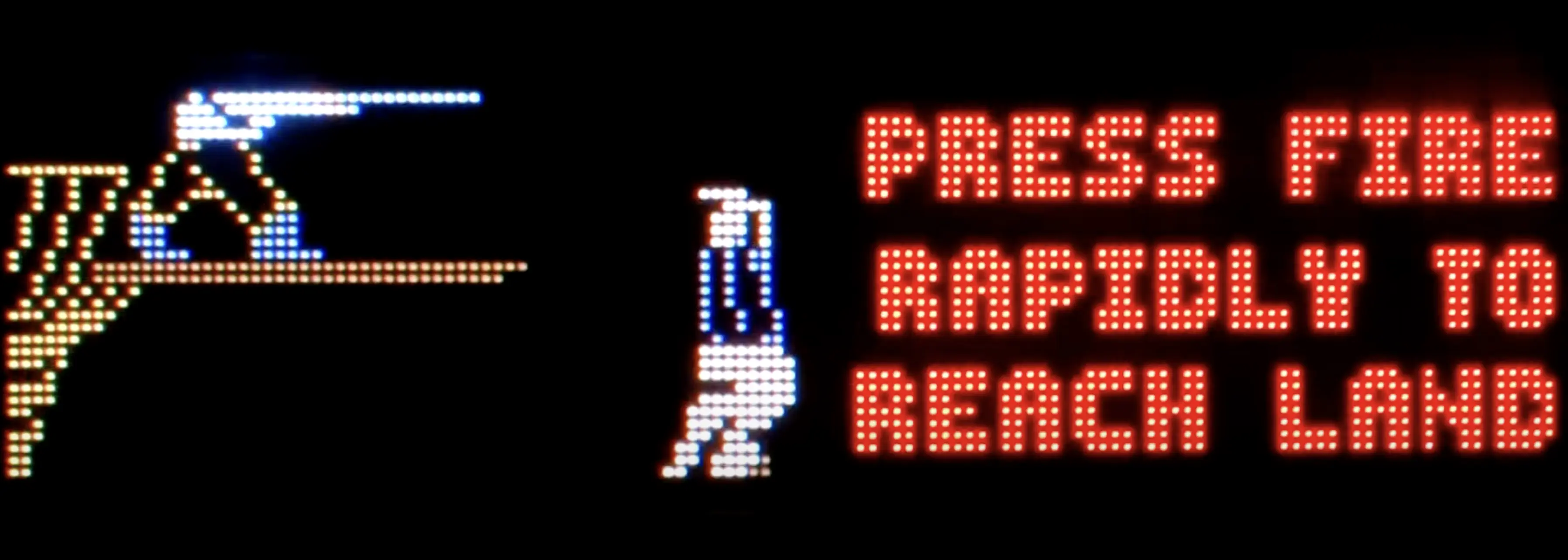 Retro pixel art of astronaut with "Press Fire to Reach Land" text