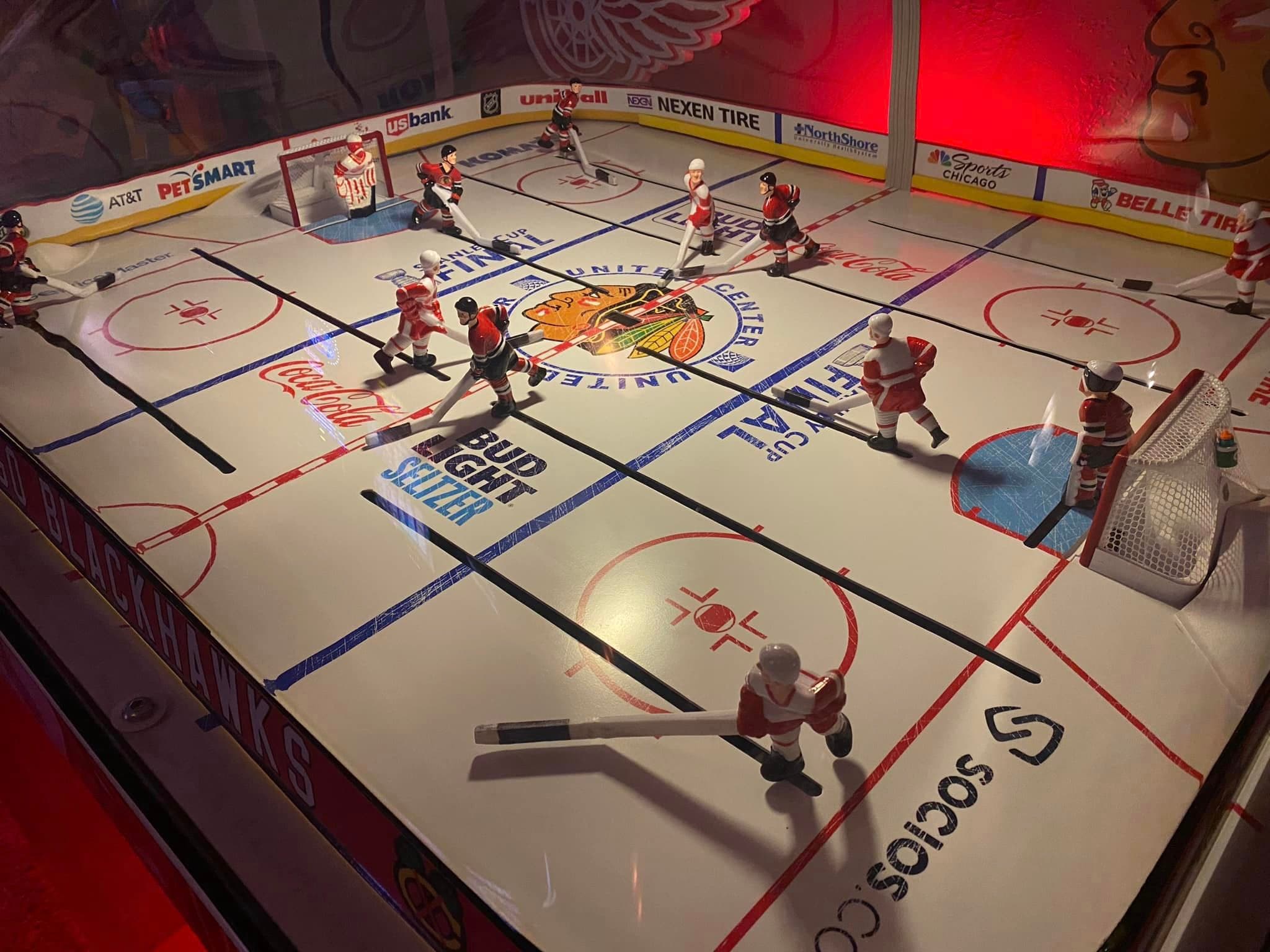 Vintage table hockey game with Chicago Blackhawks players and team logos