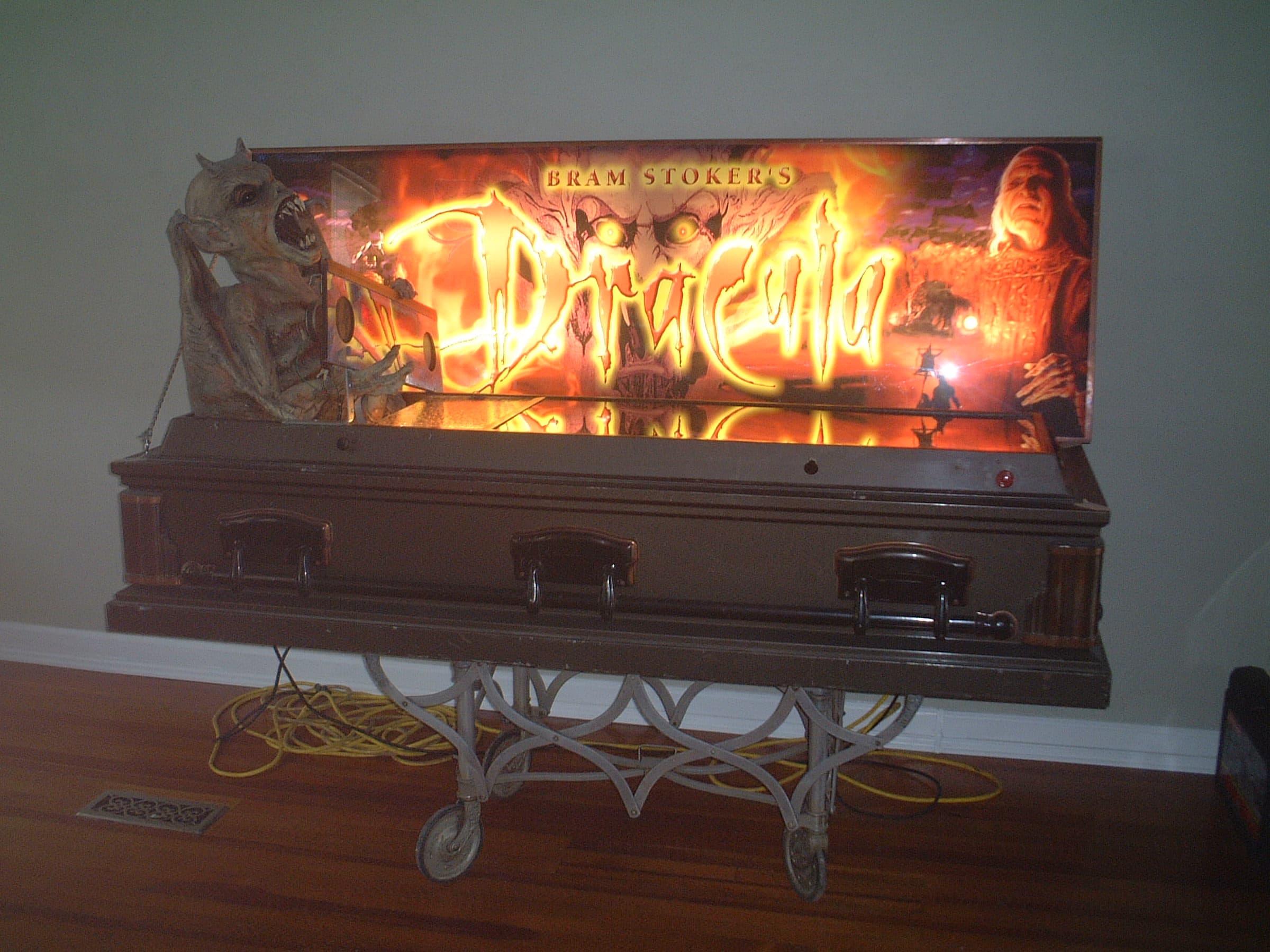 Bram Stoker's Dracula display with fiery logo on illuminated coffin stand