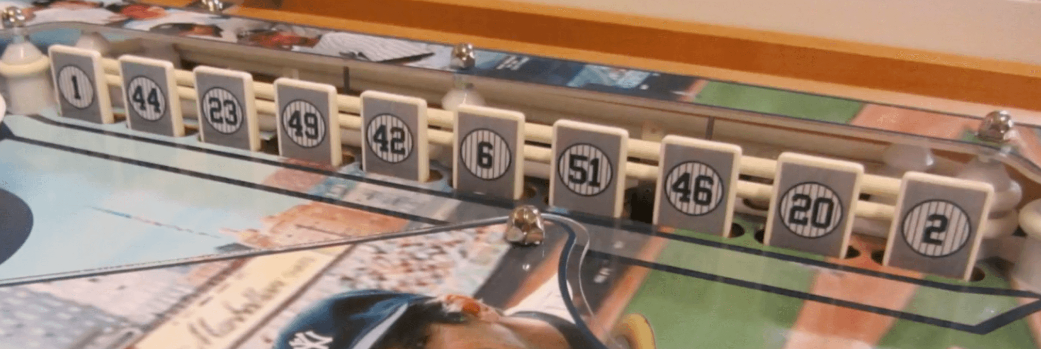 Numbered baseball player plaques on display at Yankees stadium