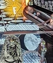 Colorful artistic illustration with sun, textured patterns, and abstract design elements