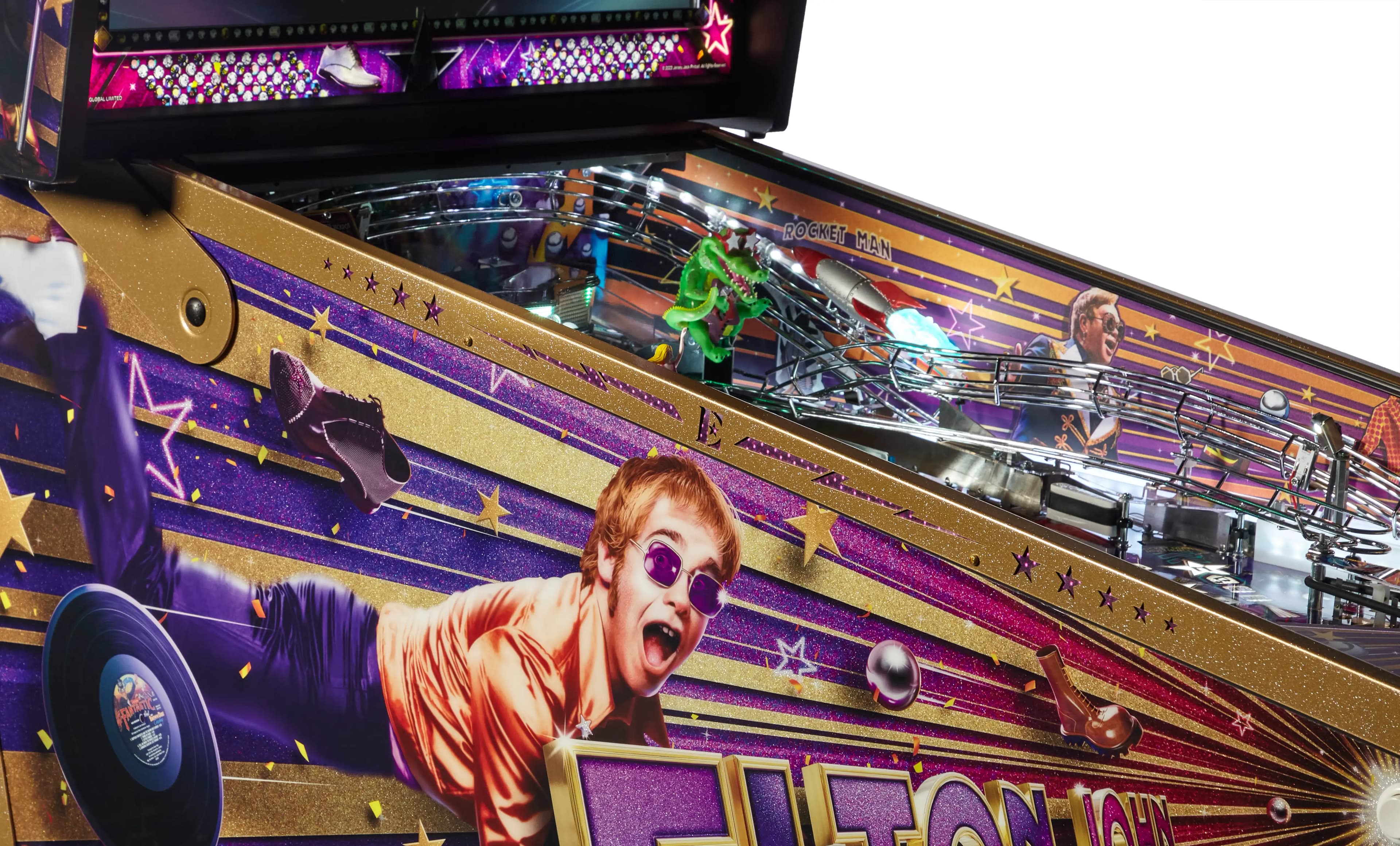 Colorful pinball machine featuring music theme with records and star design