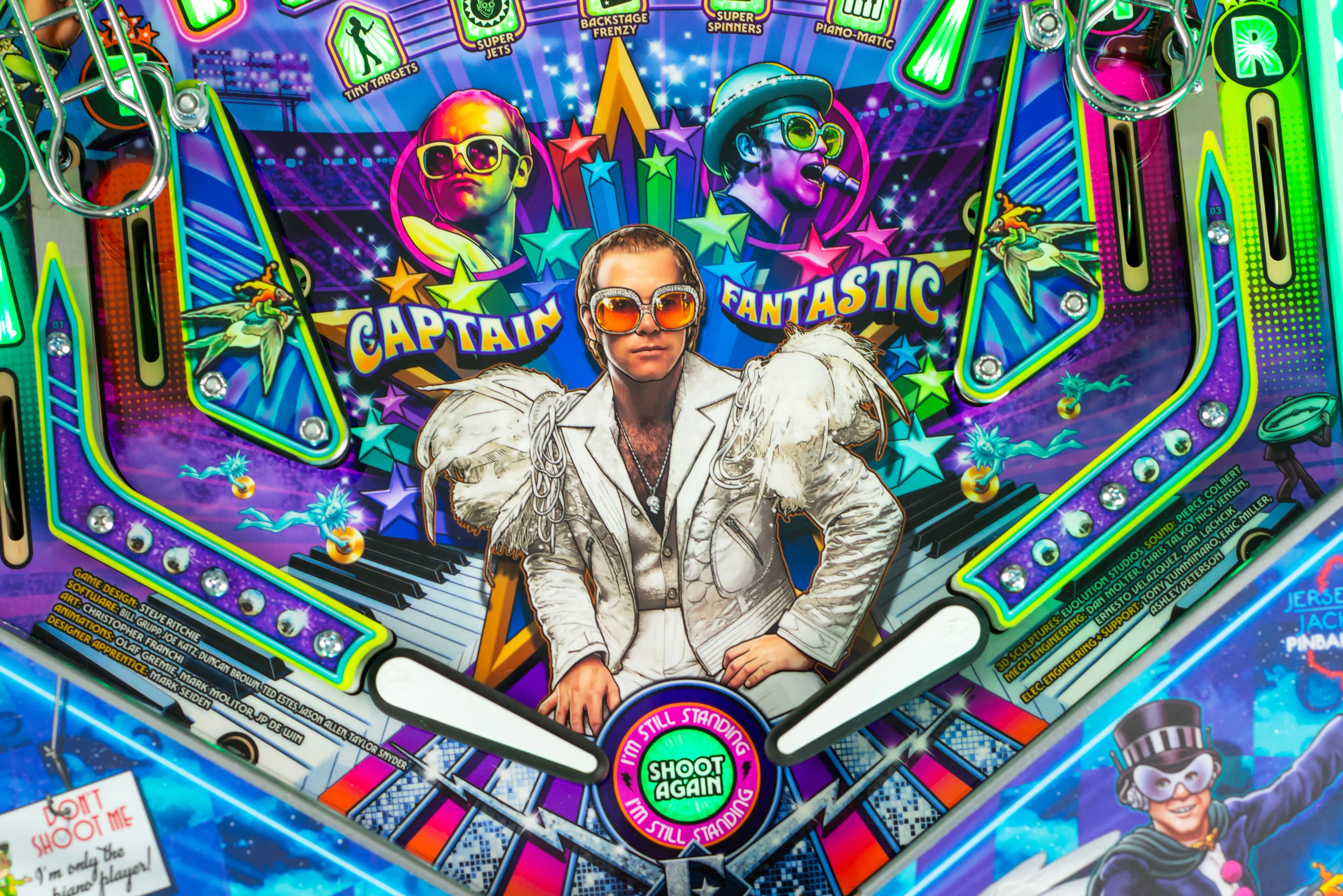 Colorful pinball machine featuring Captain Fantastic and flamboyant musicians