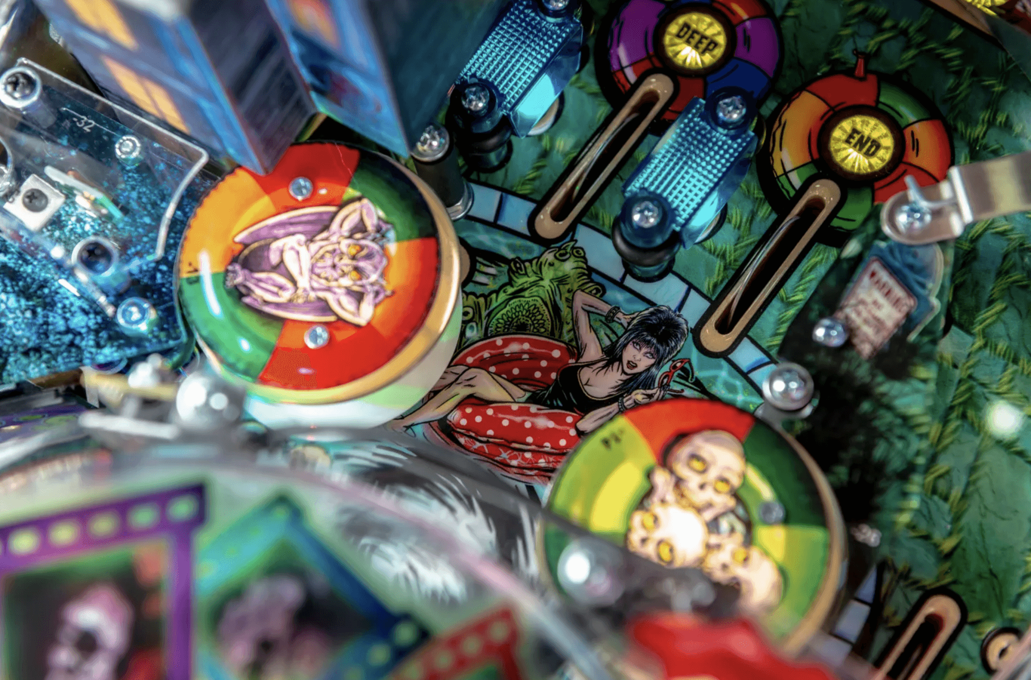 Colorful pinball machine with detailed art and mechanical components