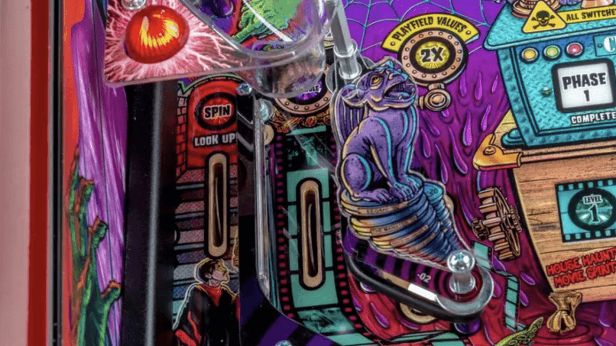 Colorful pinball machine with mystical creature and vibrant game elements