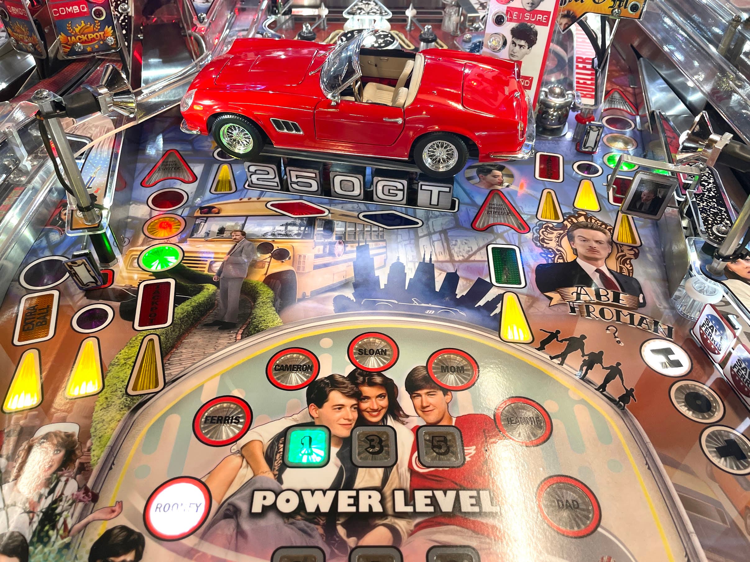 Detailed Ferris Bueller's Day Off pinball machine with red Ferrari and characters