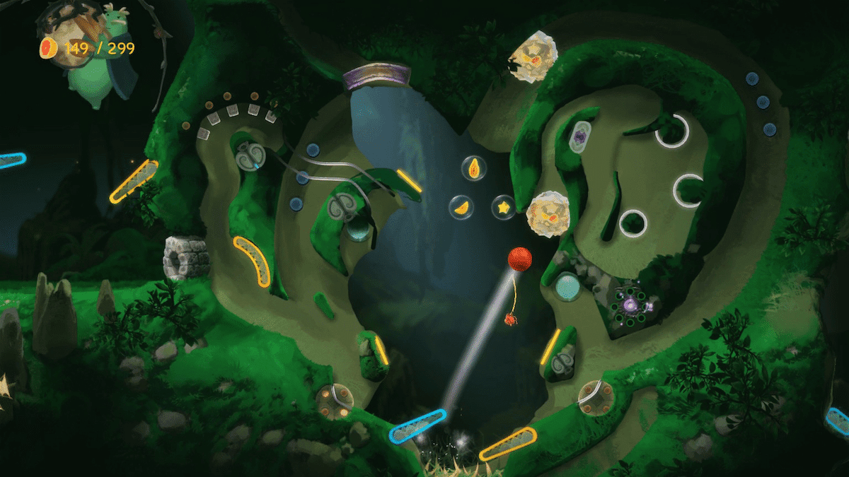 Colorful pinball-like game level with green organic landscape and floating objects