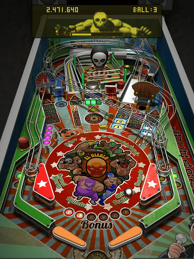 Colorful wrestling-themed pinball machine with skull and characters