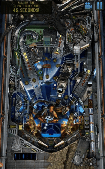 Alien-themed pinball machine with complex sci-fi mechanical design and gameplay timer