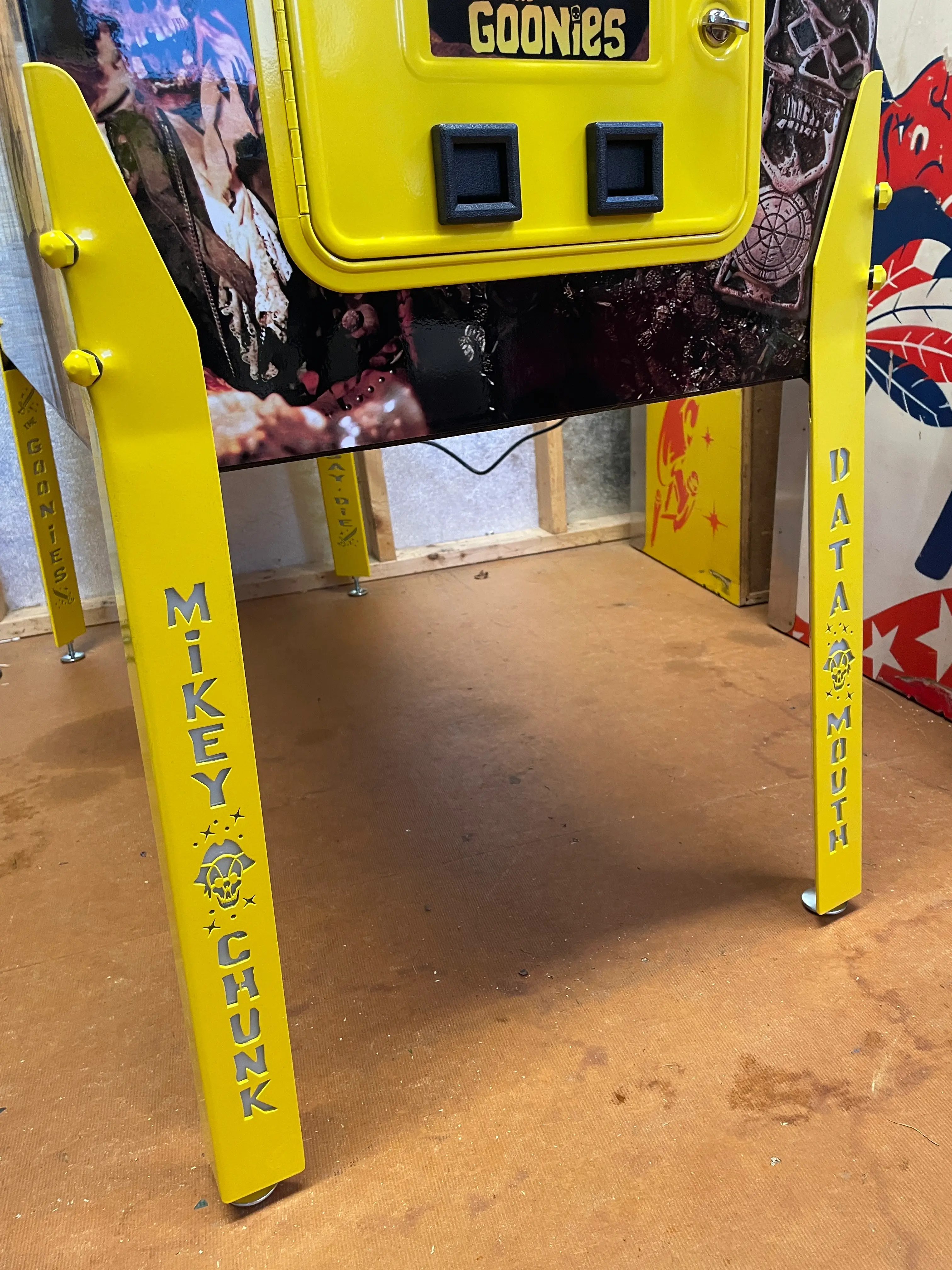 Yellow Goonies arcade machine with Mickey Chunk and Data mouth logos
