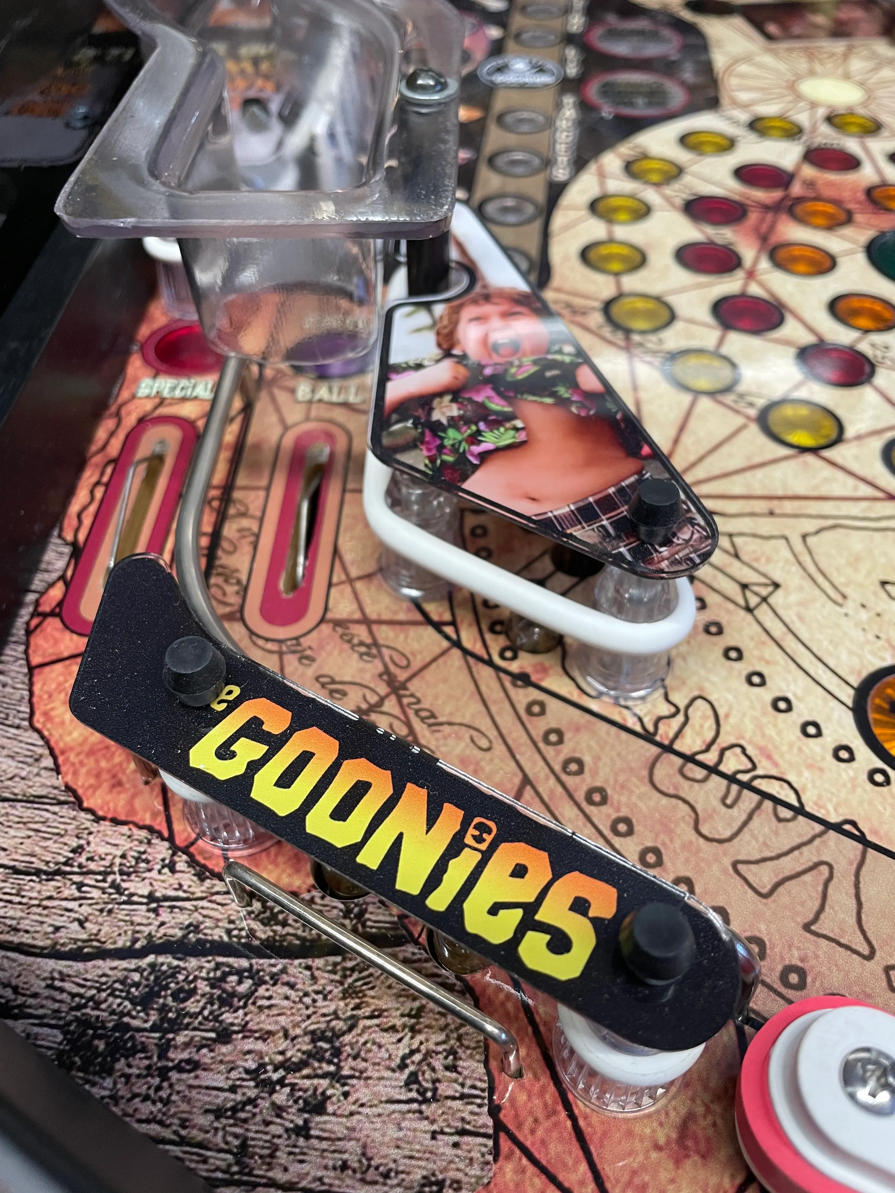 Goonies pinball machine close-up with colorful game board details