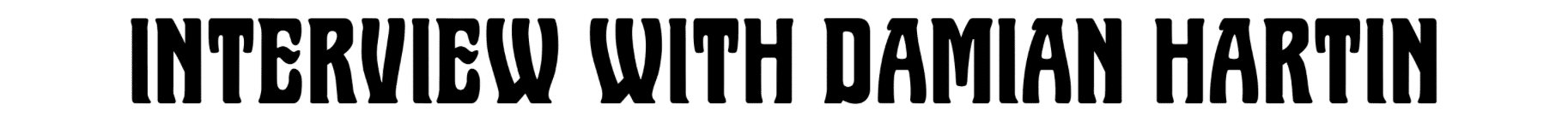 Bold black text reading "Interview with Damian Hartin"