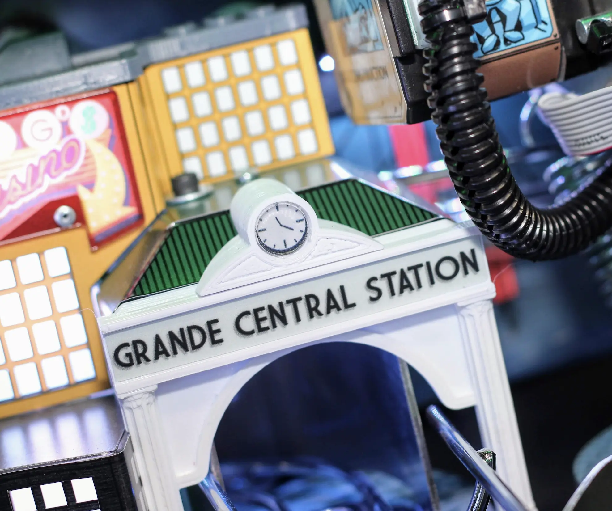Miniature Grande Central Station model with clock and colorful background