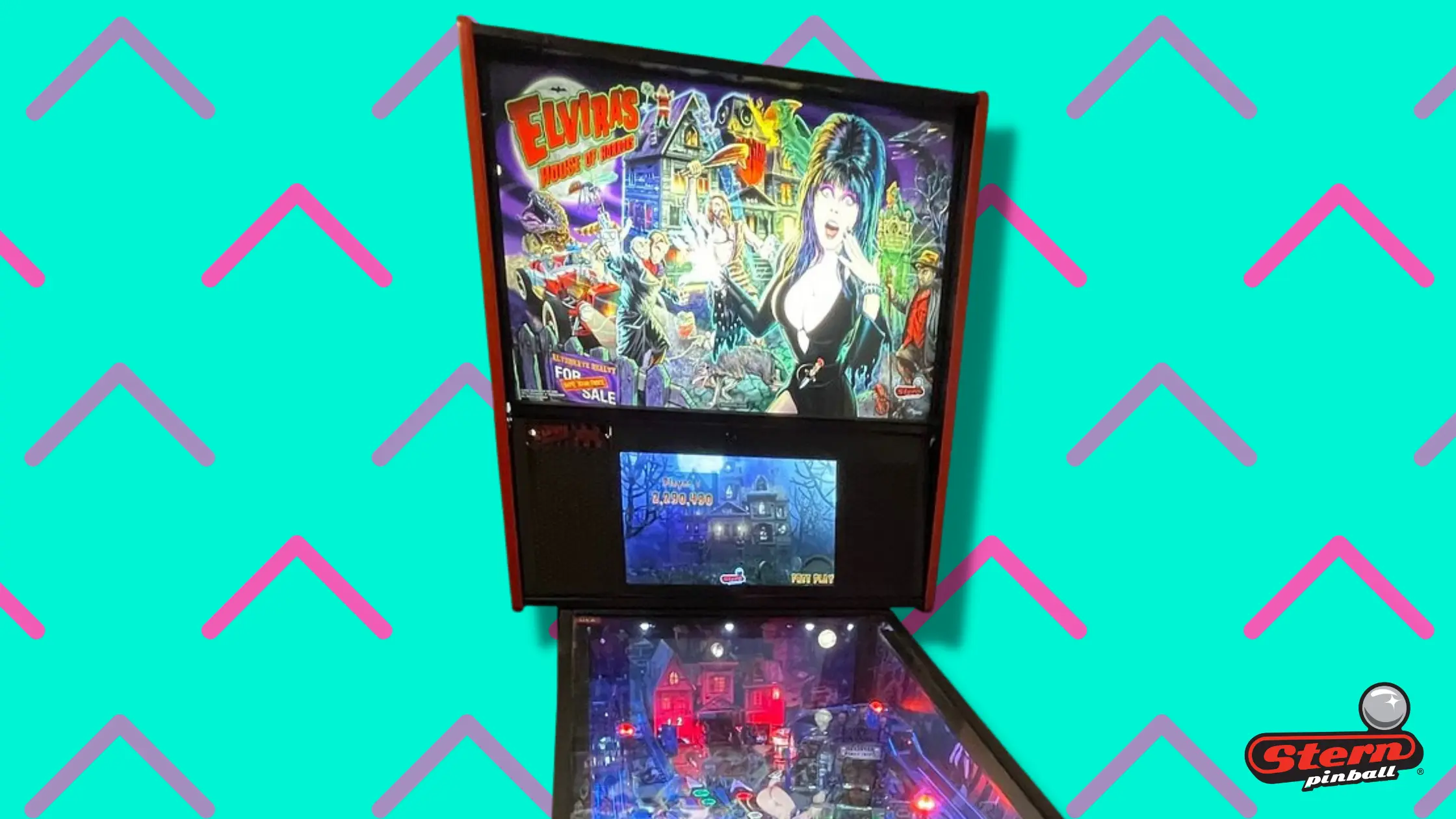 Elvira's Horror-themed pinball machine with colorful backglass and playfield