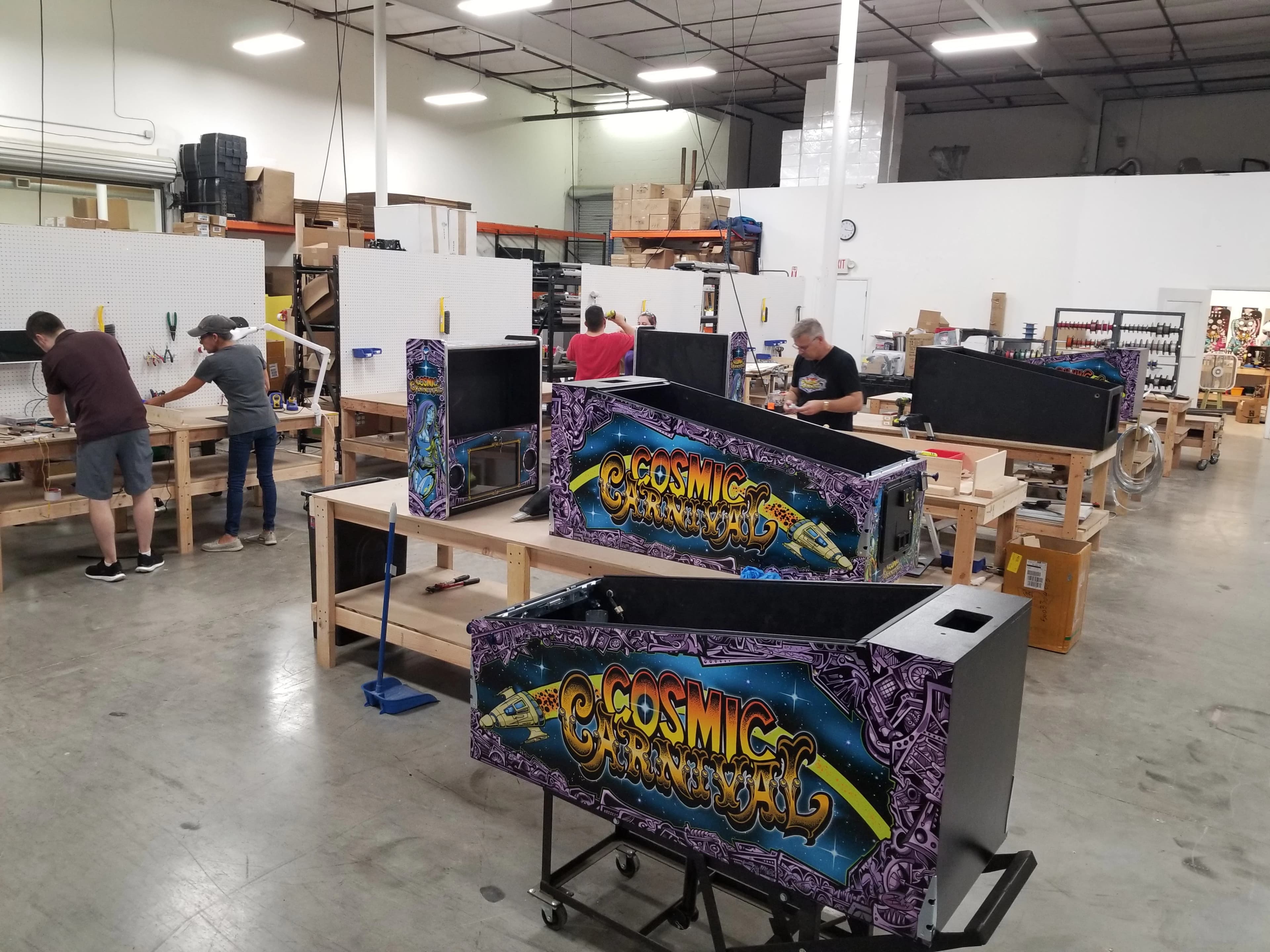 Cosmic Carnival pinball machines in production at manufacturing workshop