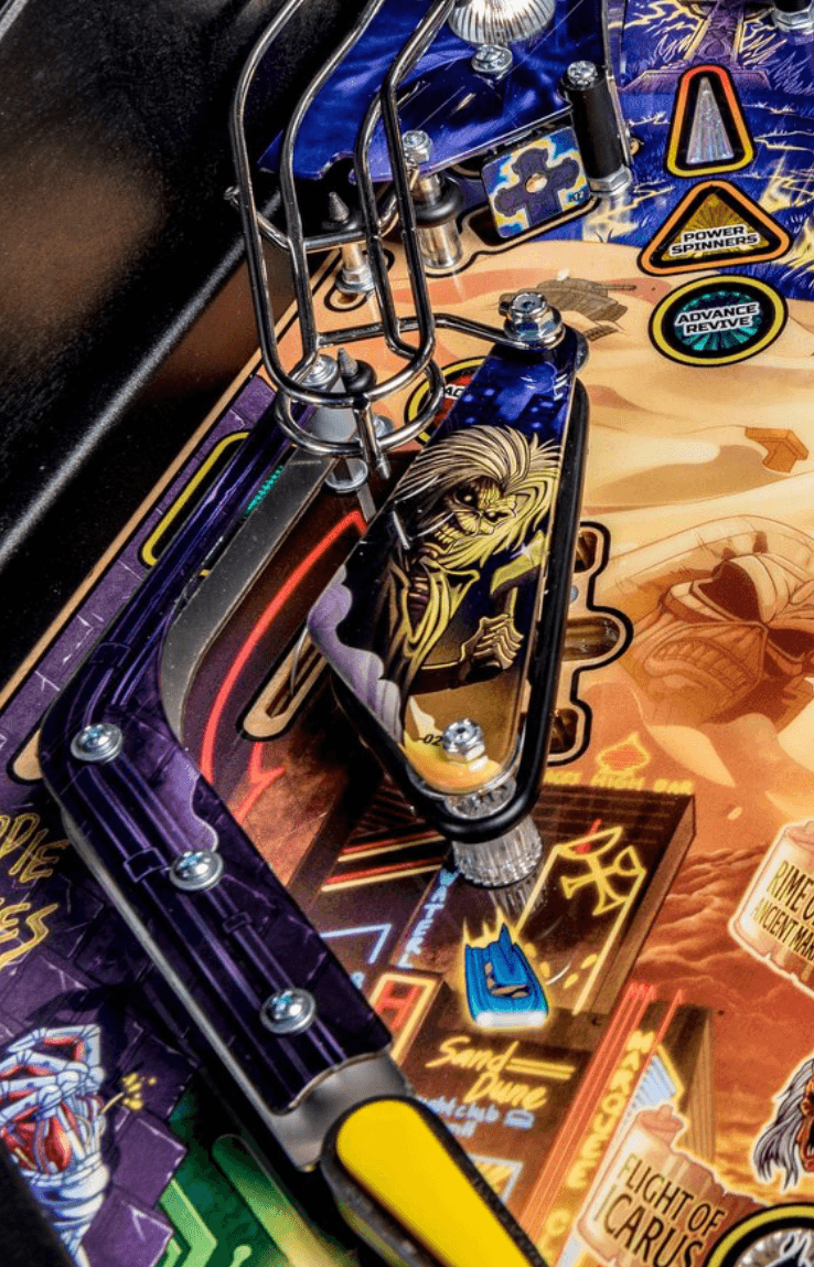 Detailed pinball machine playfield with colorful graphics and mechanical components