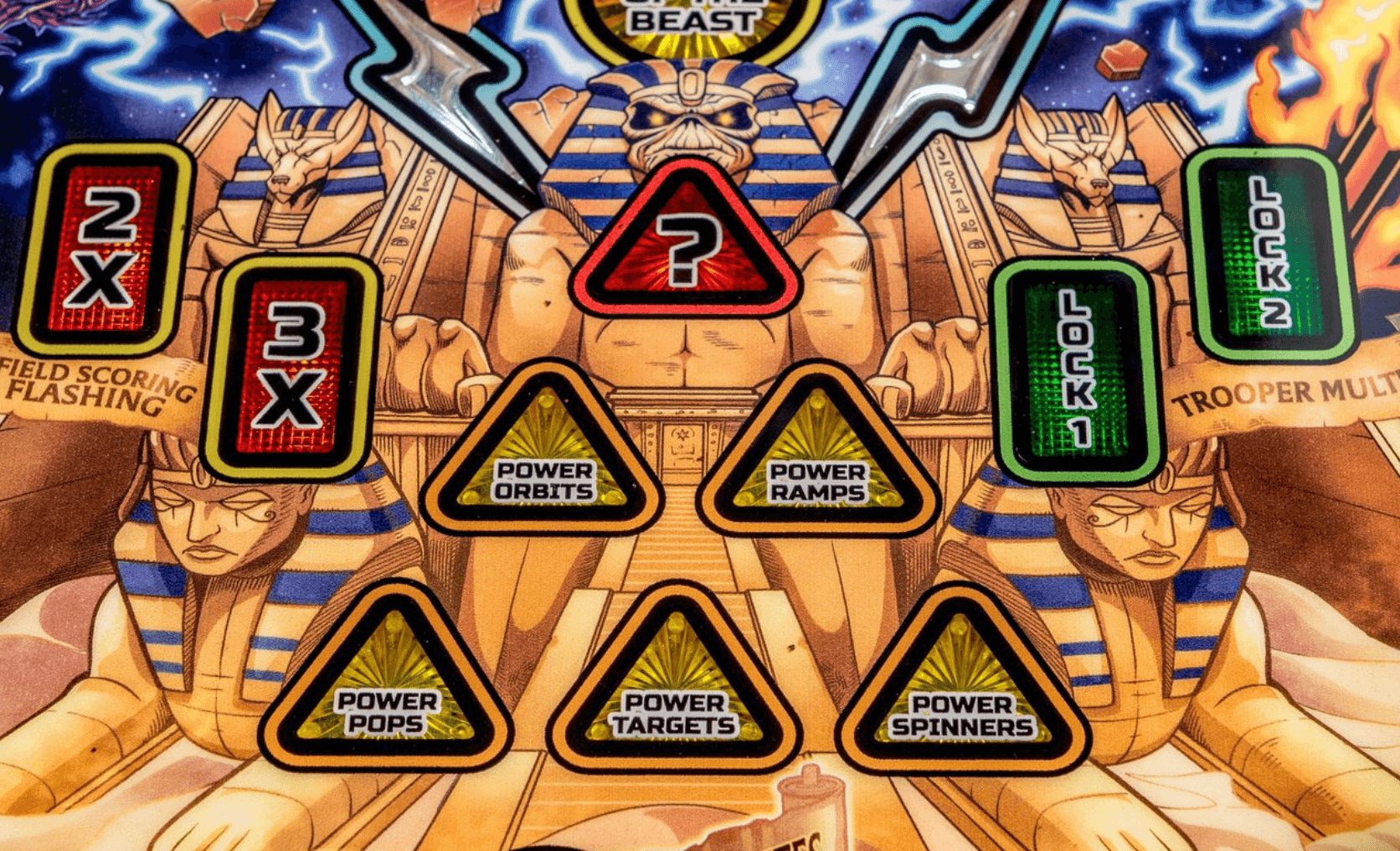 Egyptian-themed game board with power icons and lightning effects