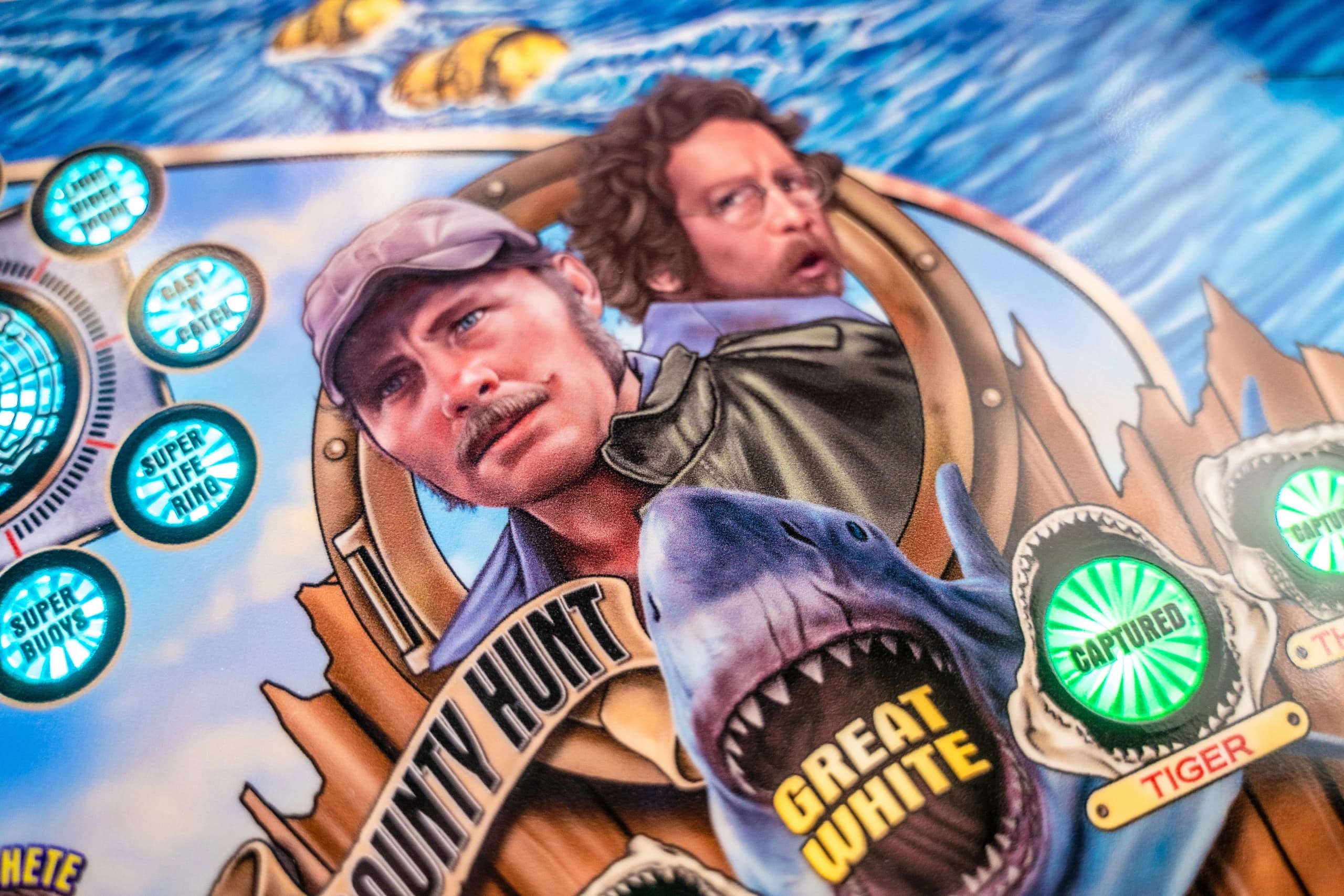 Shark hunting scene with two men in boat surrounded by marine badges