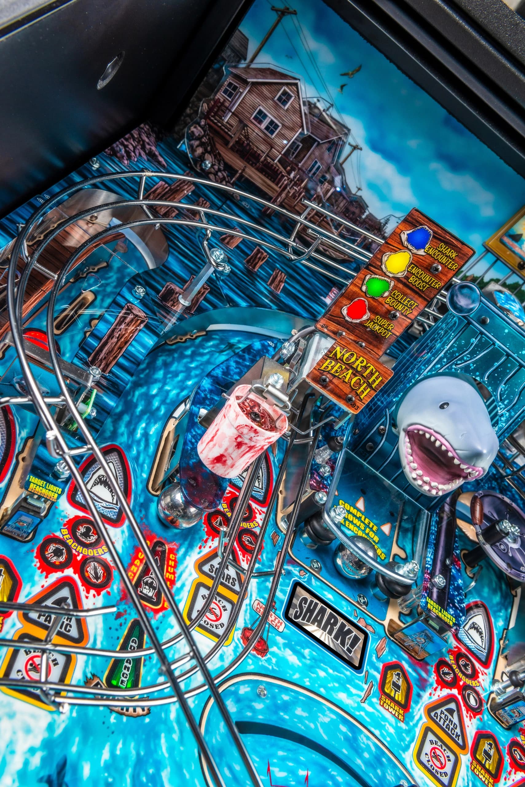 Detailed shark-themed pinball machine with blue background and metallic elements