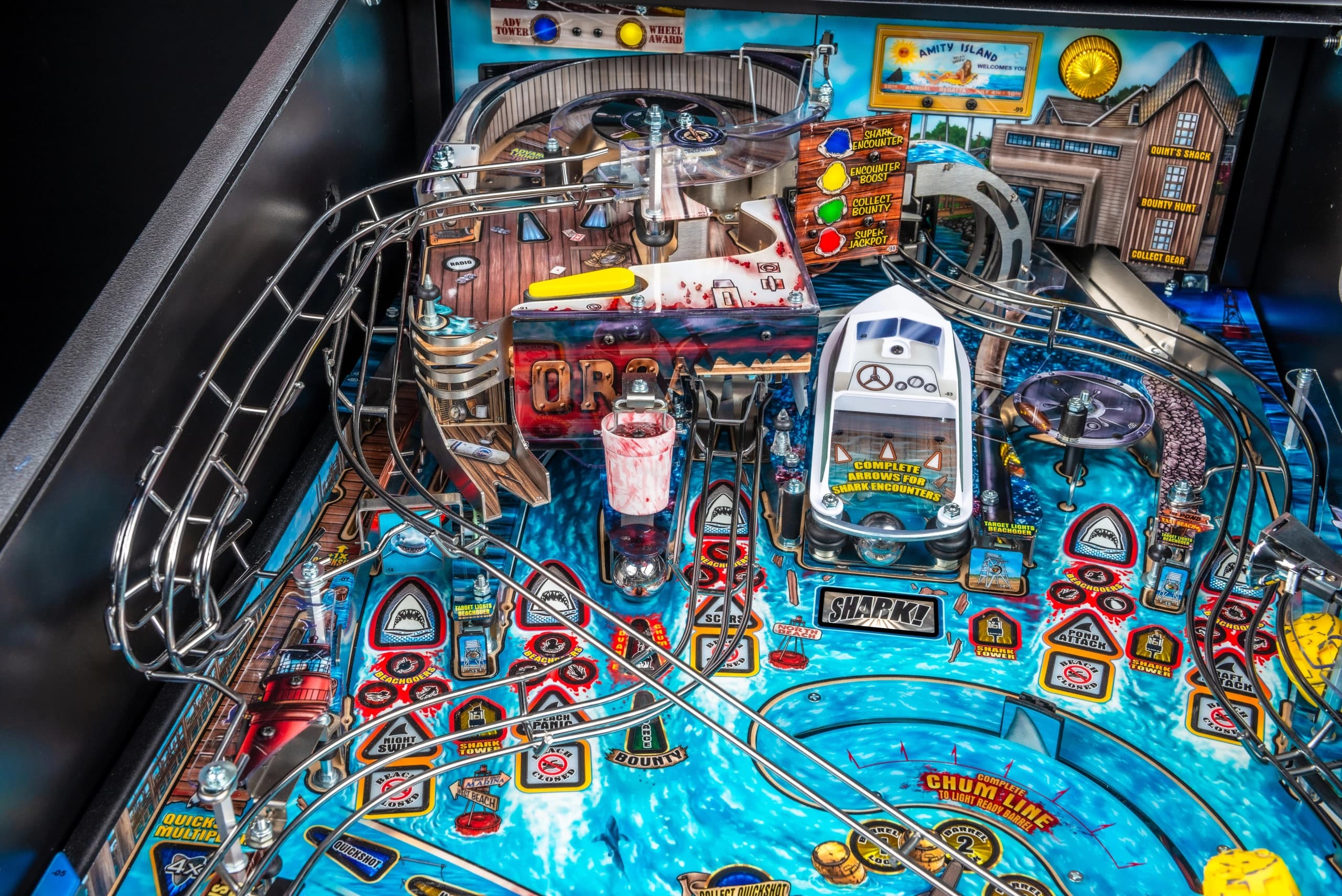 Jaws-themed pinball machine with detailed shark and ocean elements