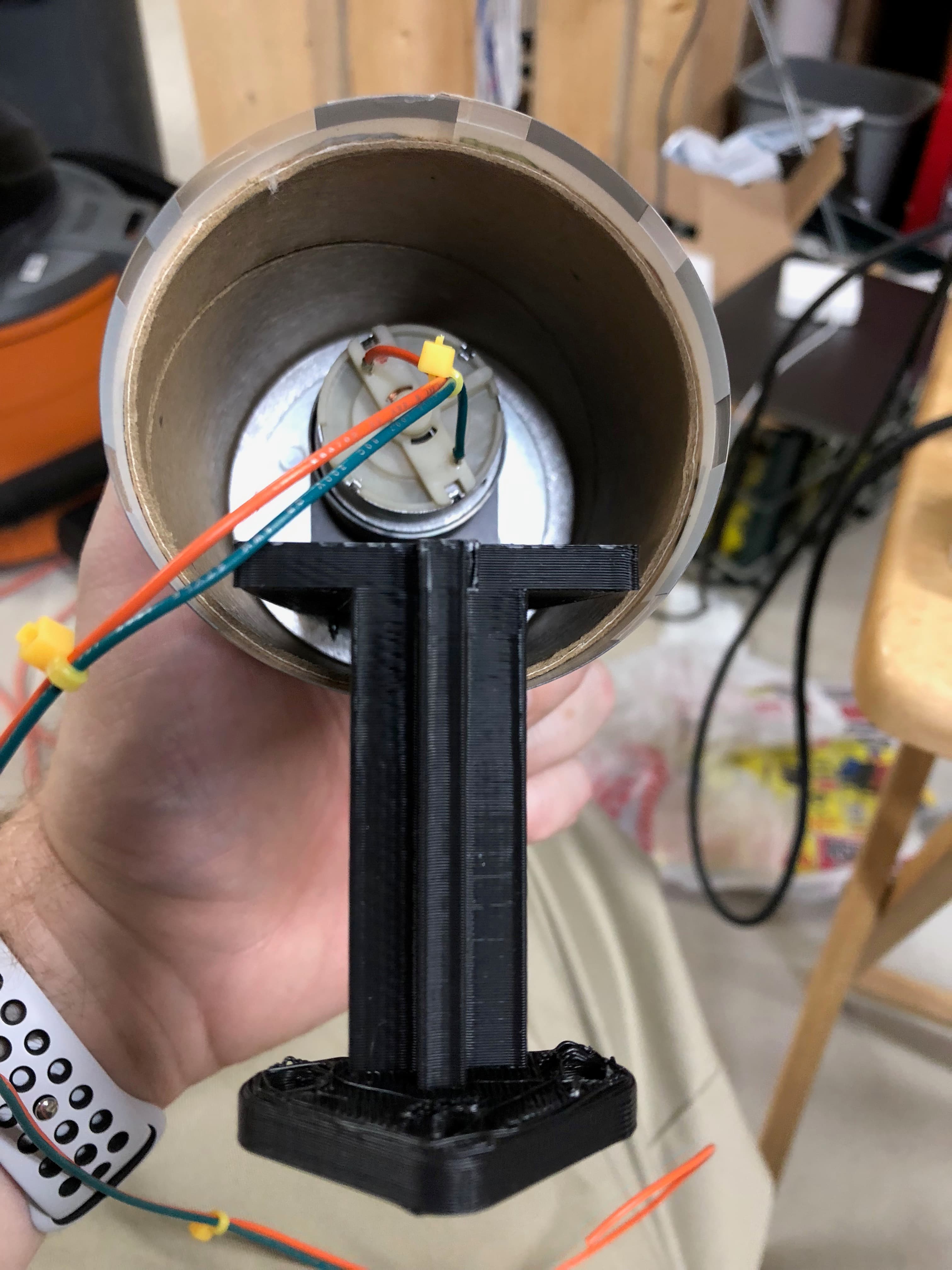 3D printed mount with electrical wiring inside metallic cylindrical component