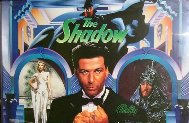 Vintage movie poster for The Shadow with characters in stylized design