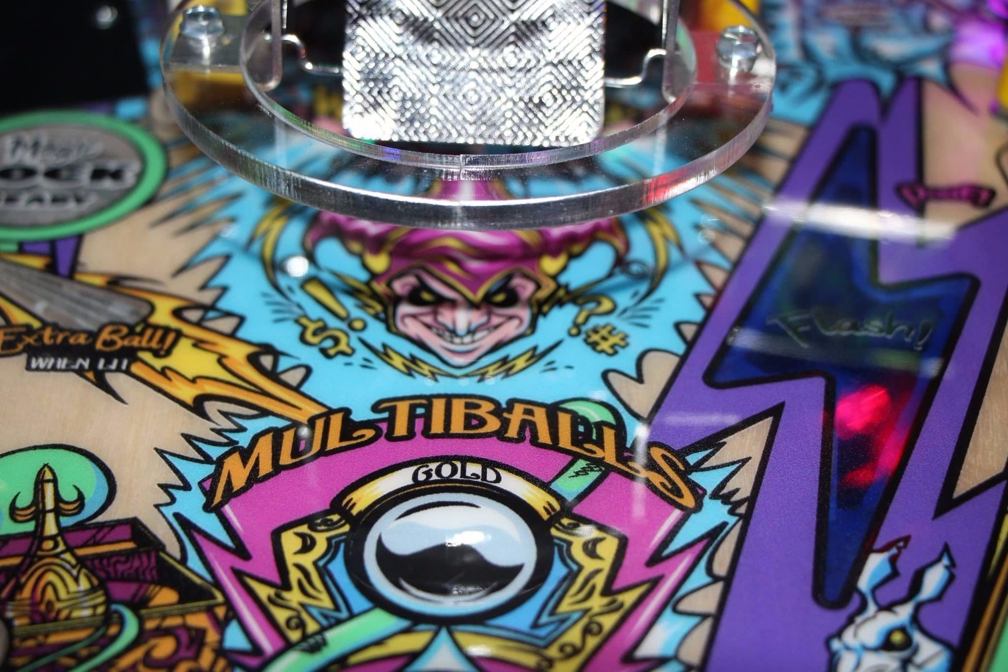 Colorful Multiball pinball machine artwork with cartoon character