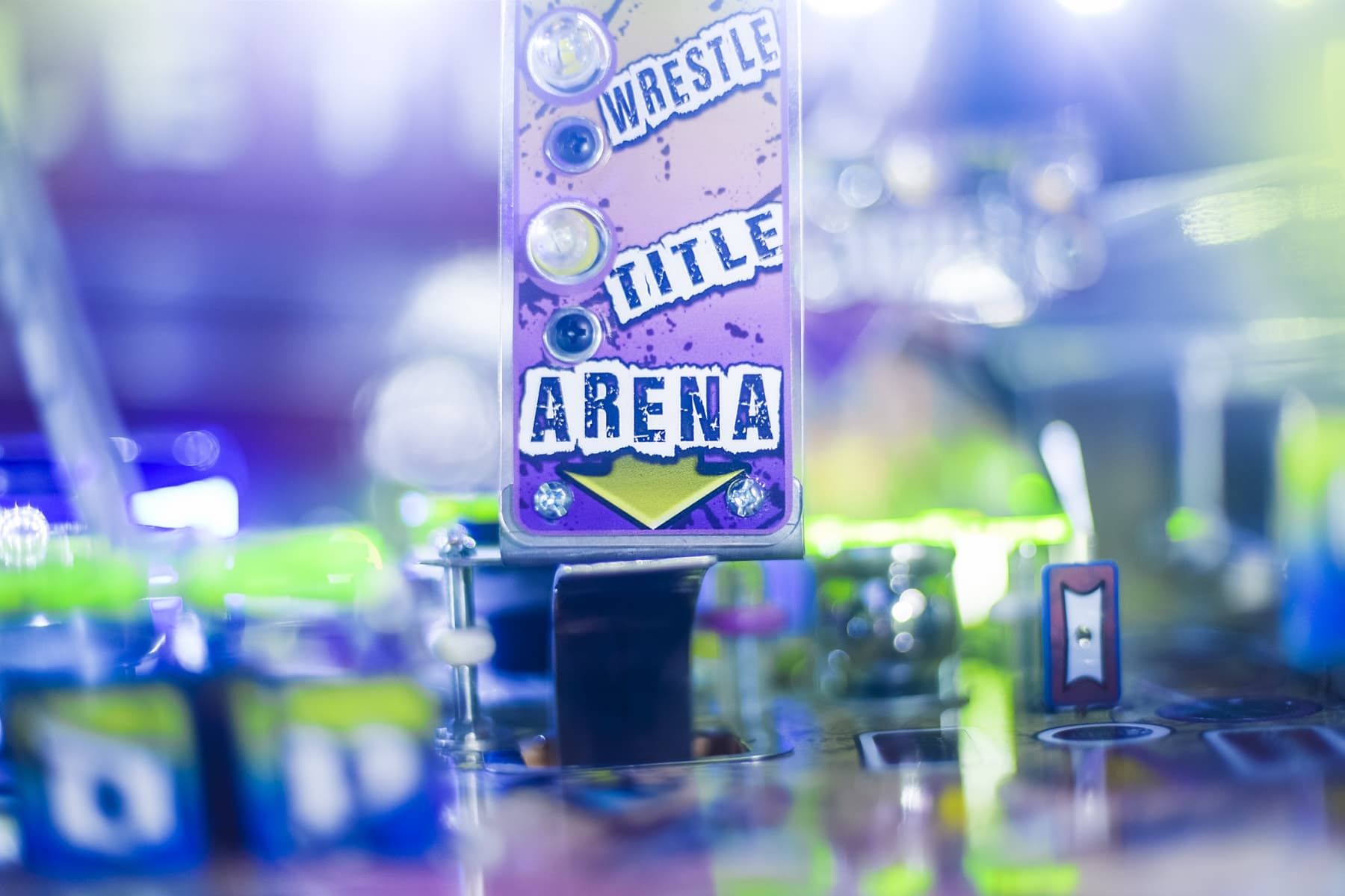 Wrestle Title Arena card with blue and purple color scheme