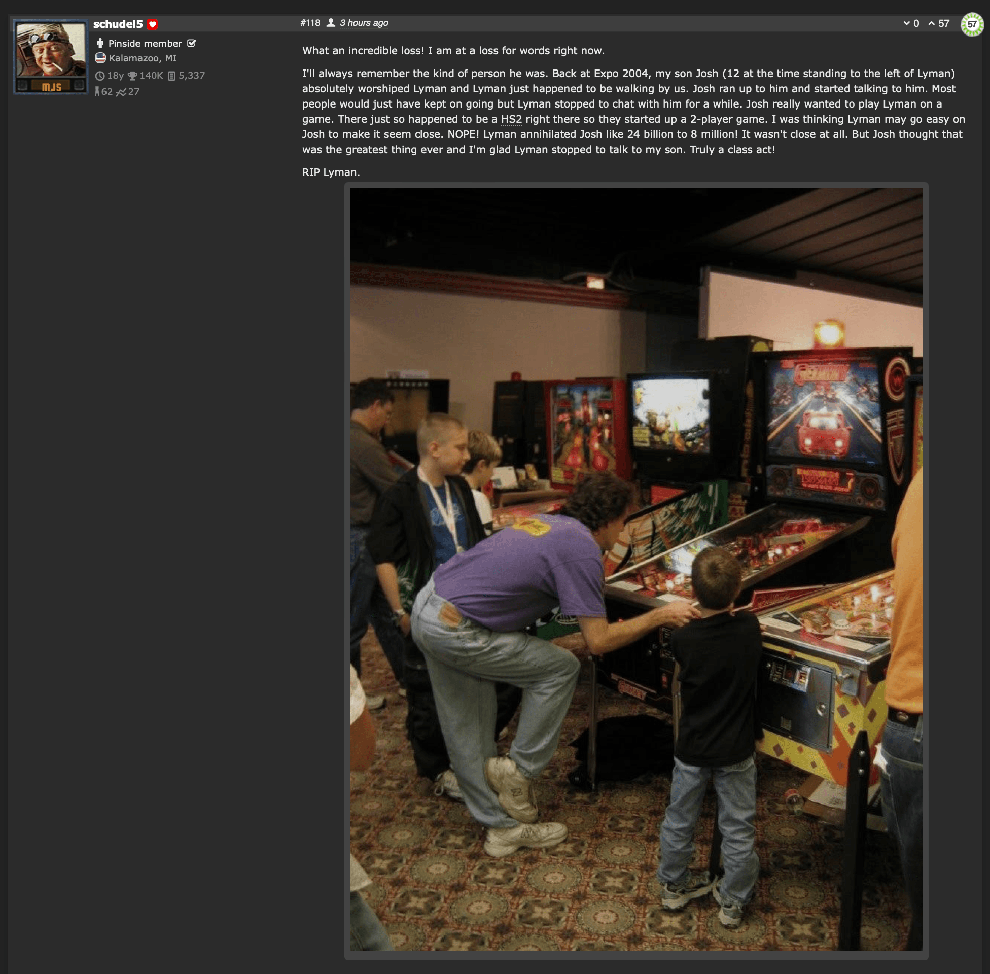 People playing pinball machines at a vintage arcade gaming event