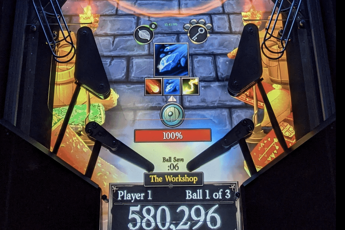 Pinball machine screen showing game progress in The Workshop level