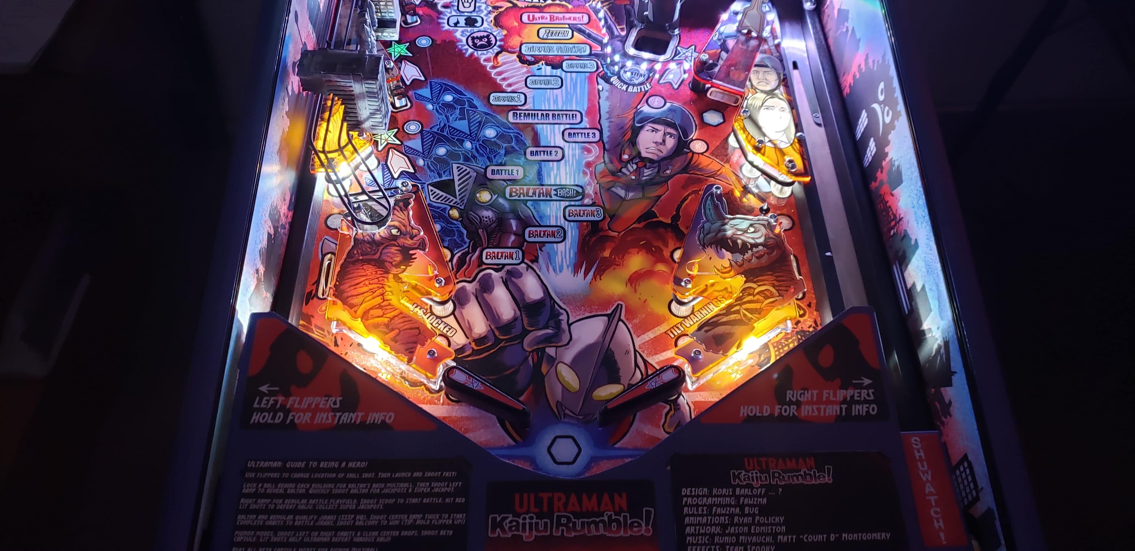 Ultraman Kaiju Rumble pinball machine with vibrant battle scenes and flippers