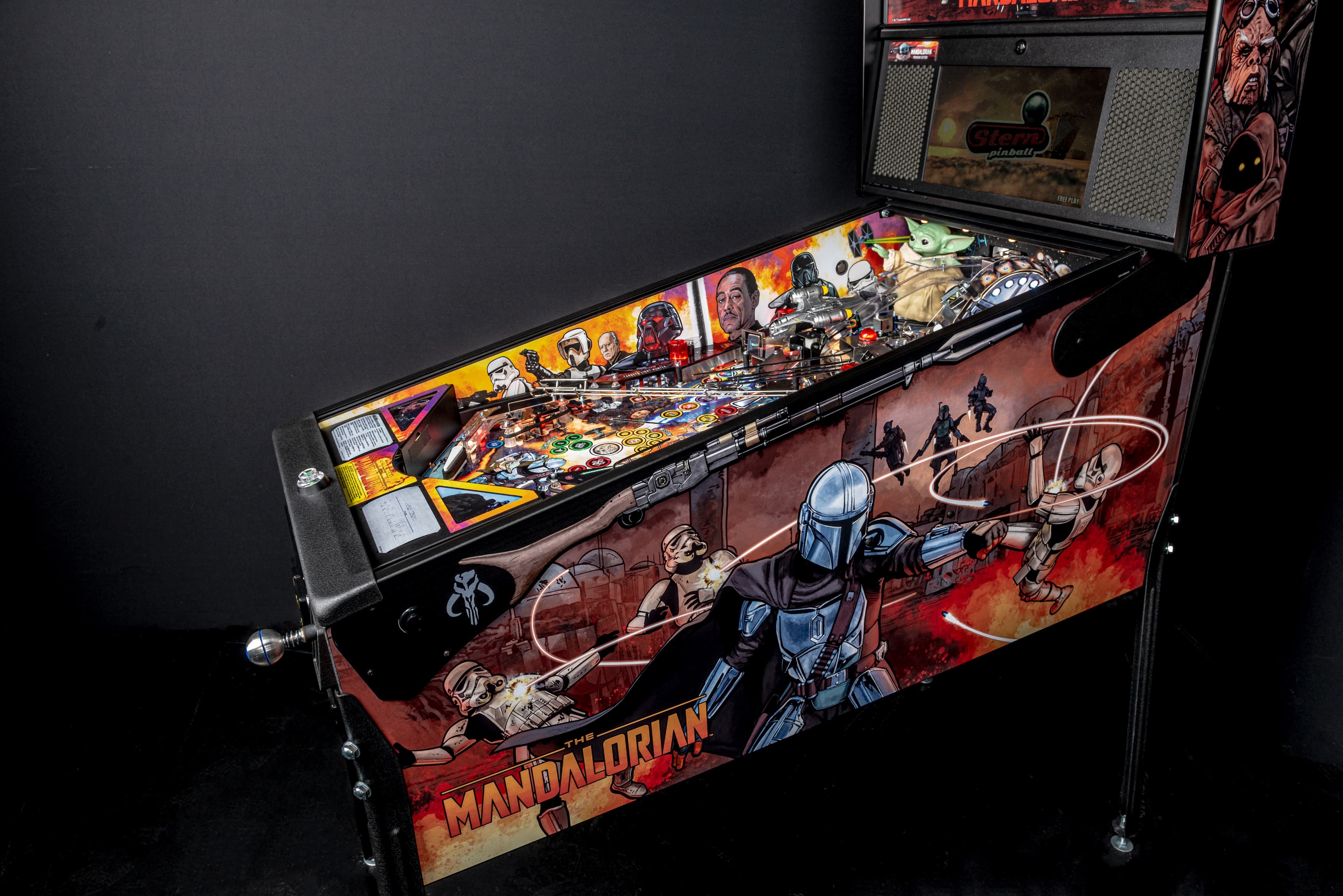 The Mandalorian pinball machine with detailed Star Wars characters and scenes