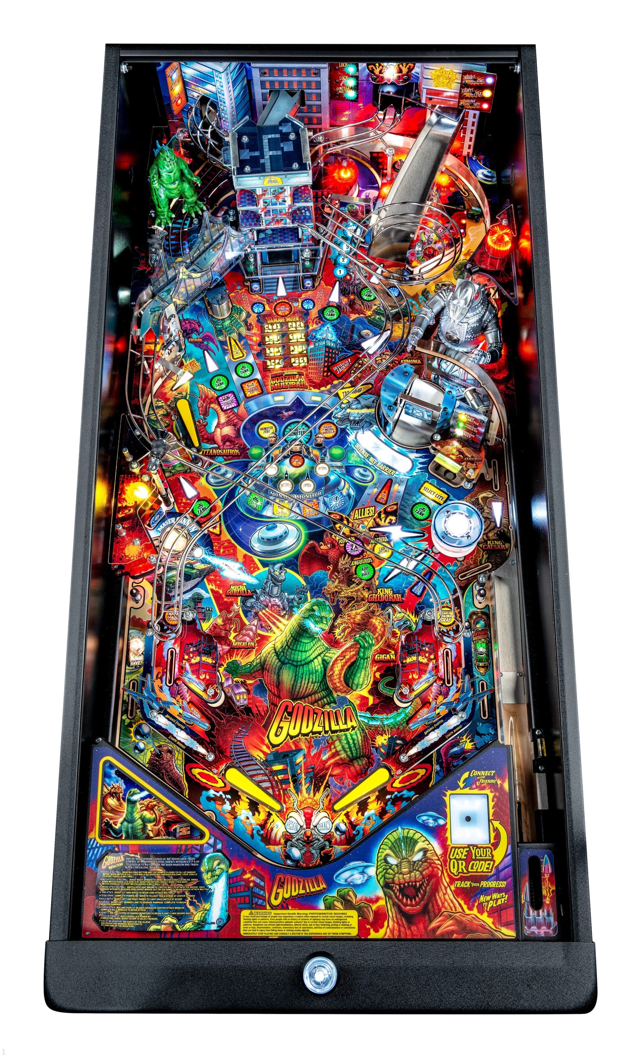 Colorful Godzilla-themed pinball machine with intricate monster and city design