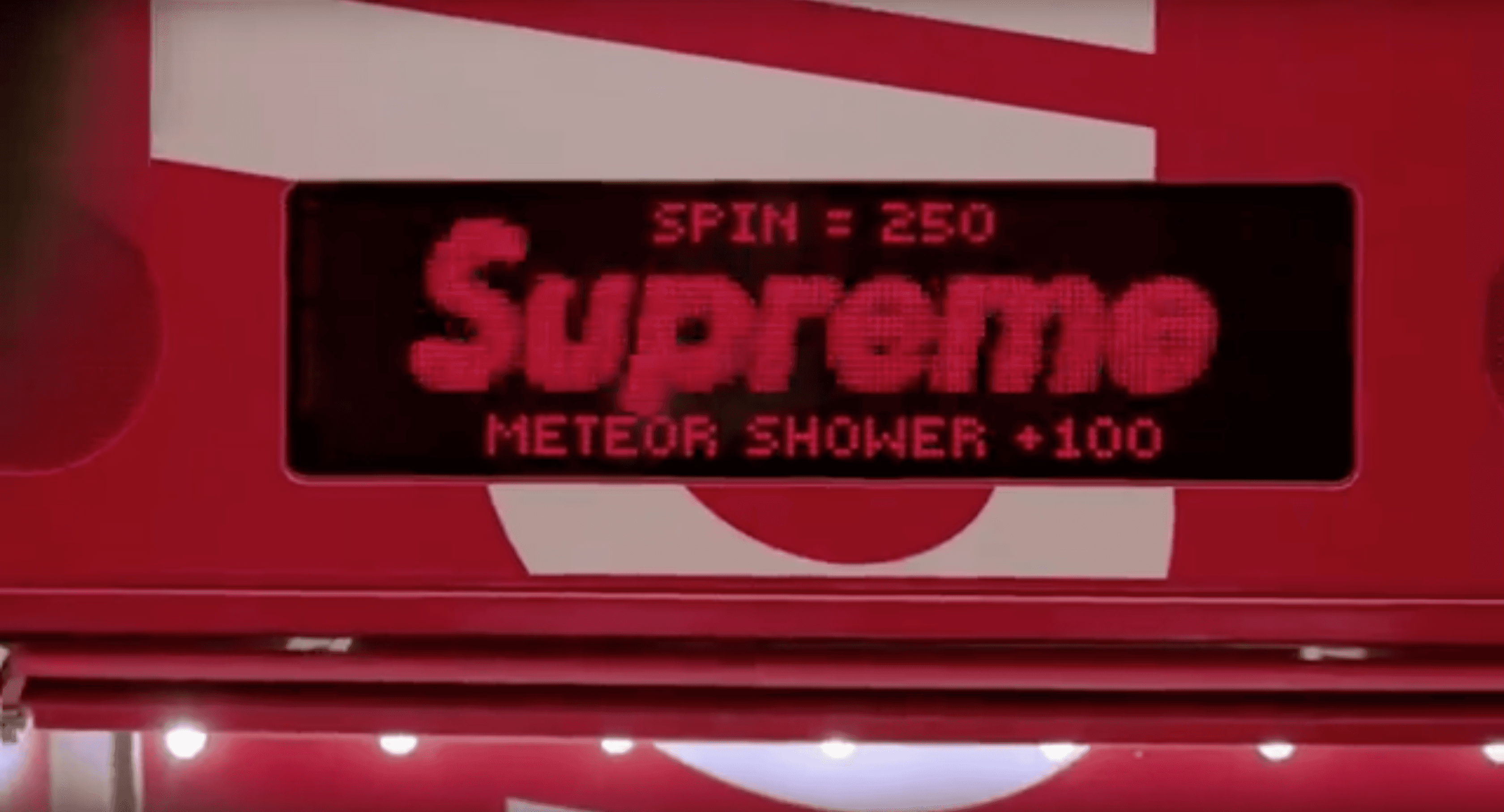 Supreme arcade game screen with meteor shower score display