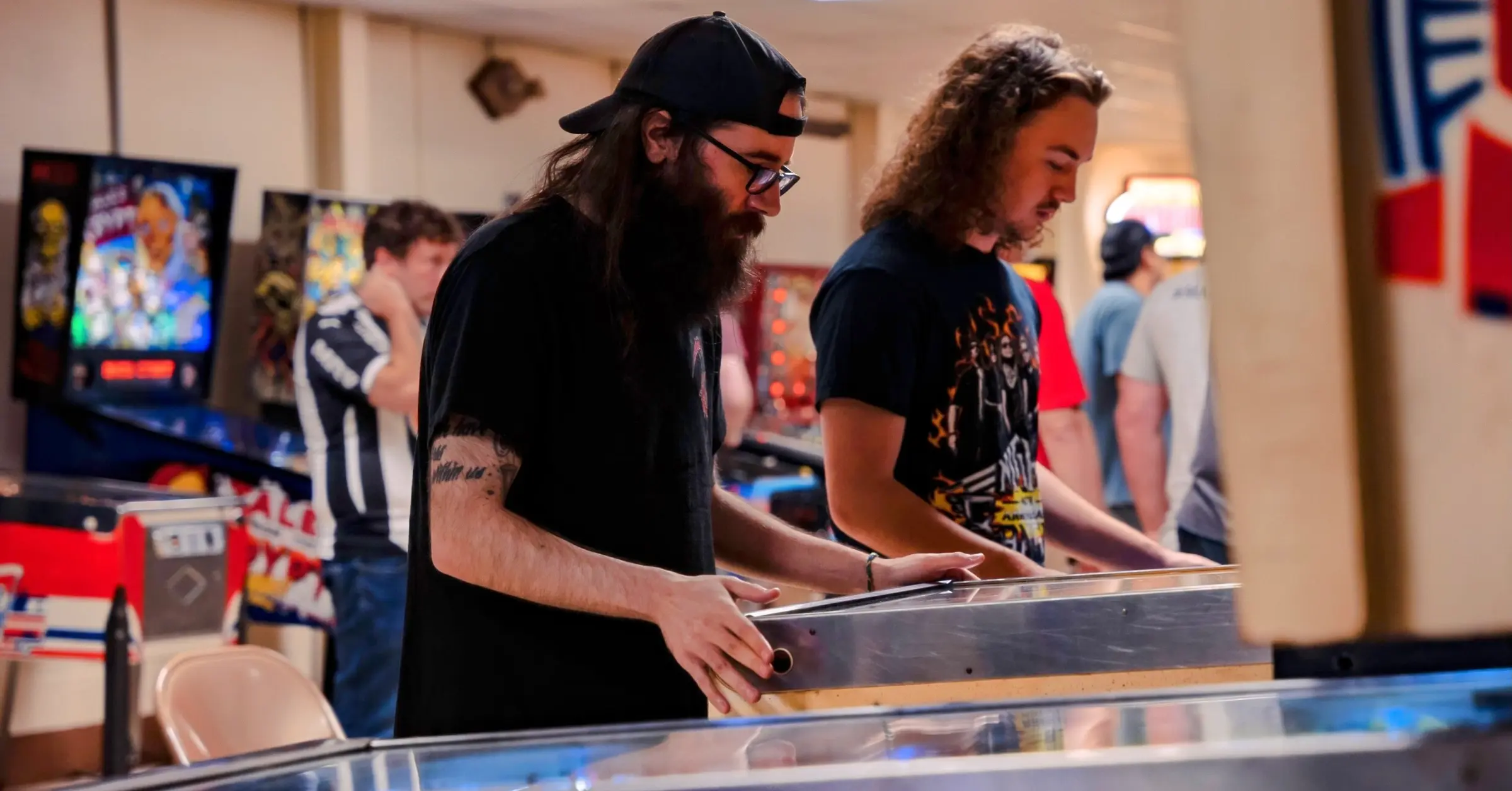 Players compete in the 2024 Sweeper City Pinball Championships