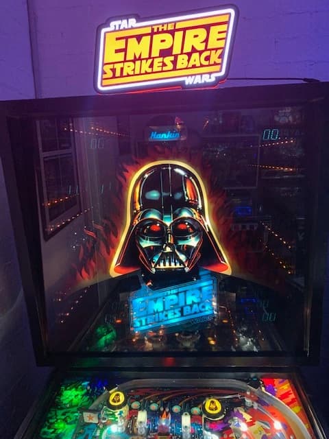 The Empire Strikes Back pinball machine featuring glowing Darth Vader head