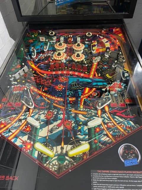 Star Wars Empire Strikes Back themed pinball machine with colorful playfield