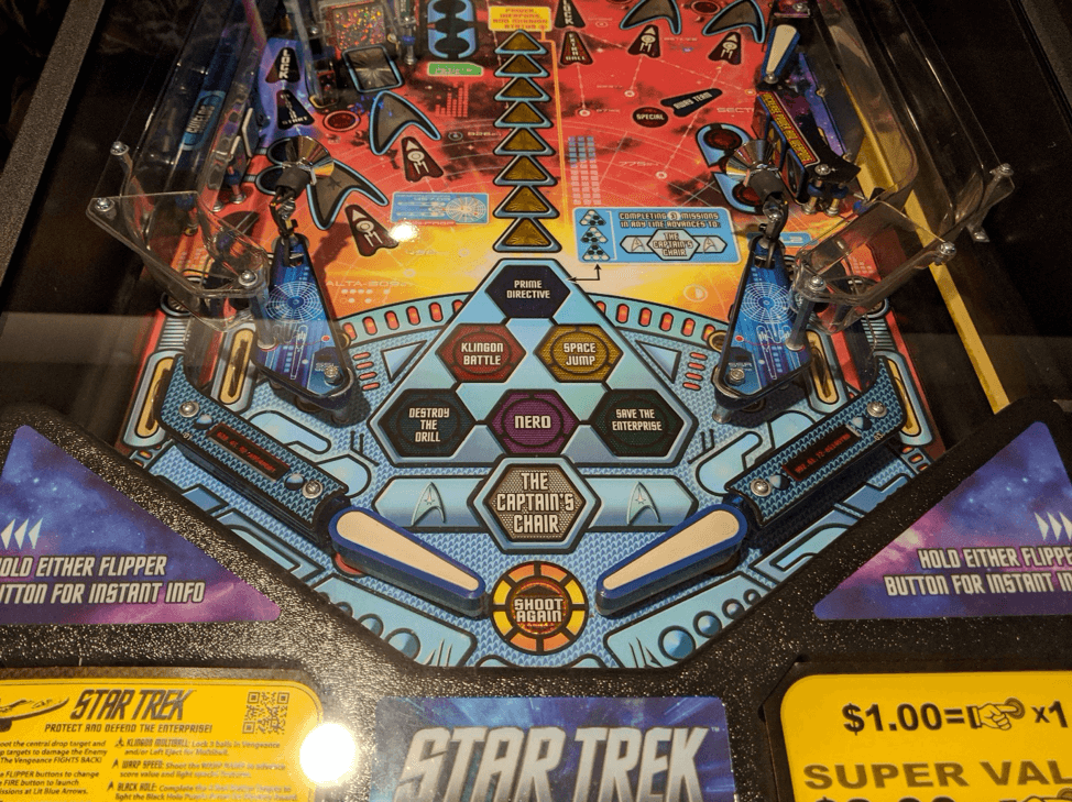 Star Trek pinball machine with colorful playfield and themed game zones