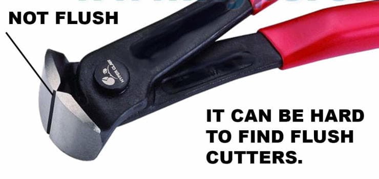 Black and red flush cutting pliers with warning text about difficult availability