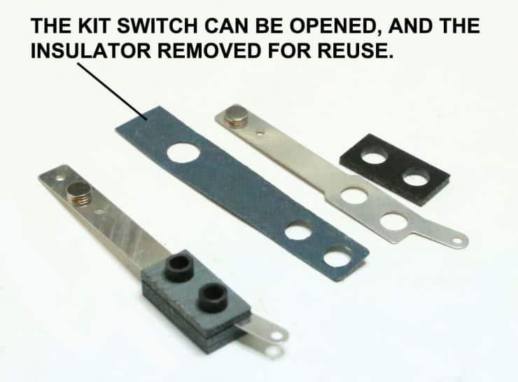 Kit switch components in different colors, showing removable insulator