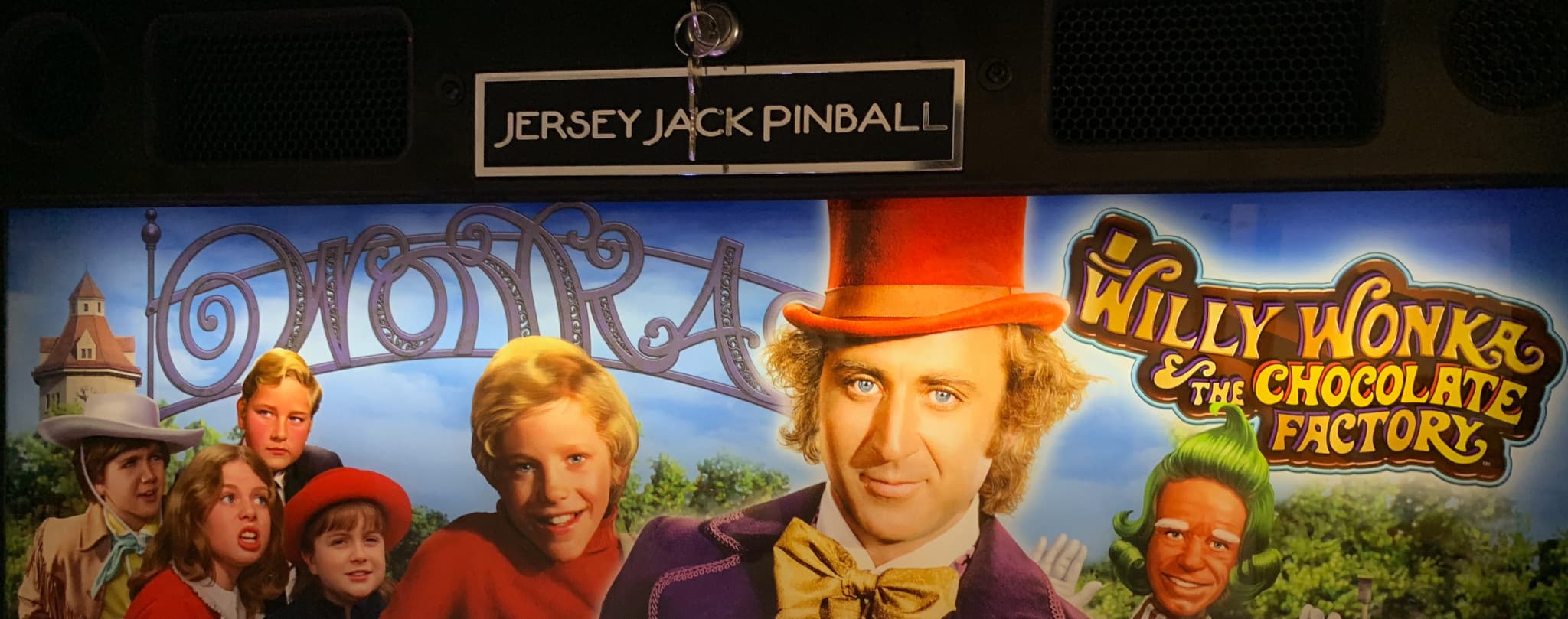 Willy Wonka and the Chocolate Factory movie poster with characters