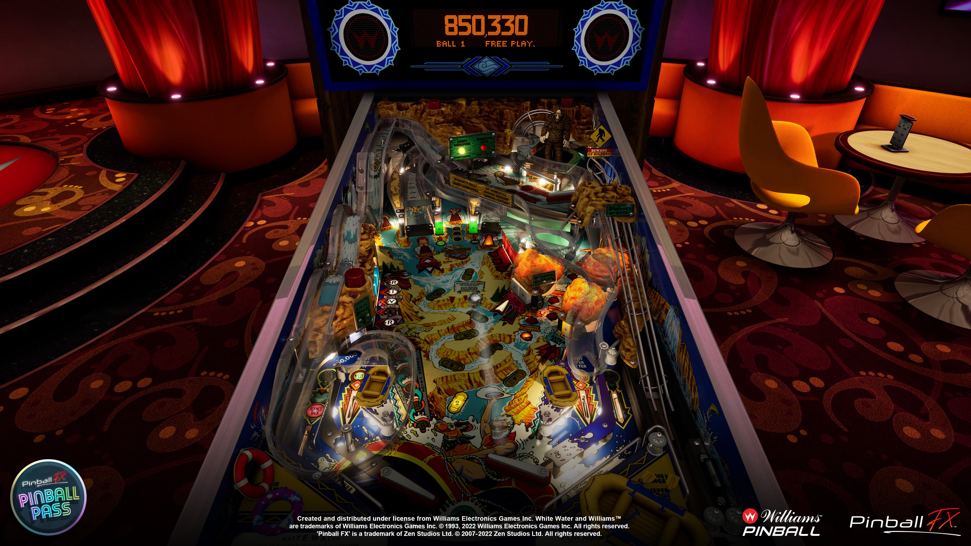 Colorful pinball machine with detailed playfield and electronic scoreboard